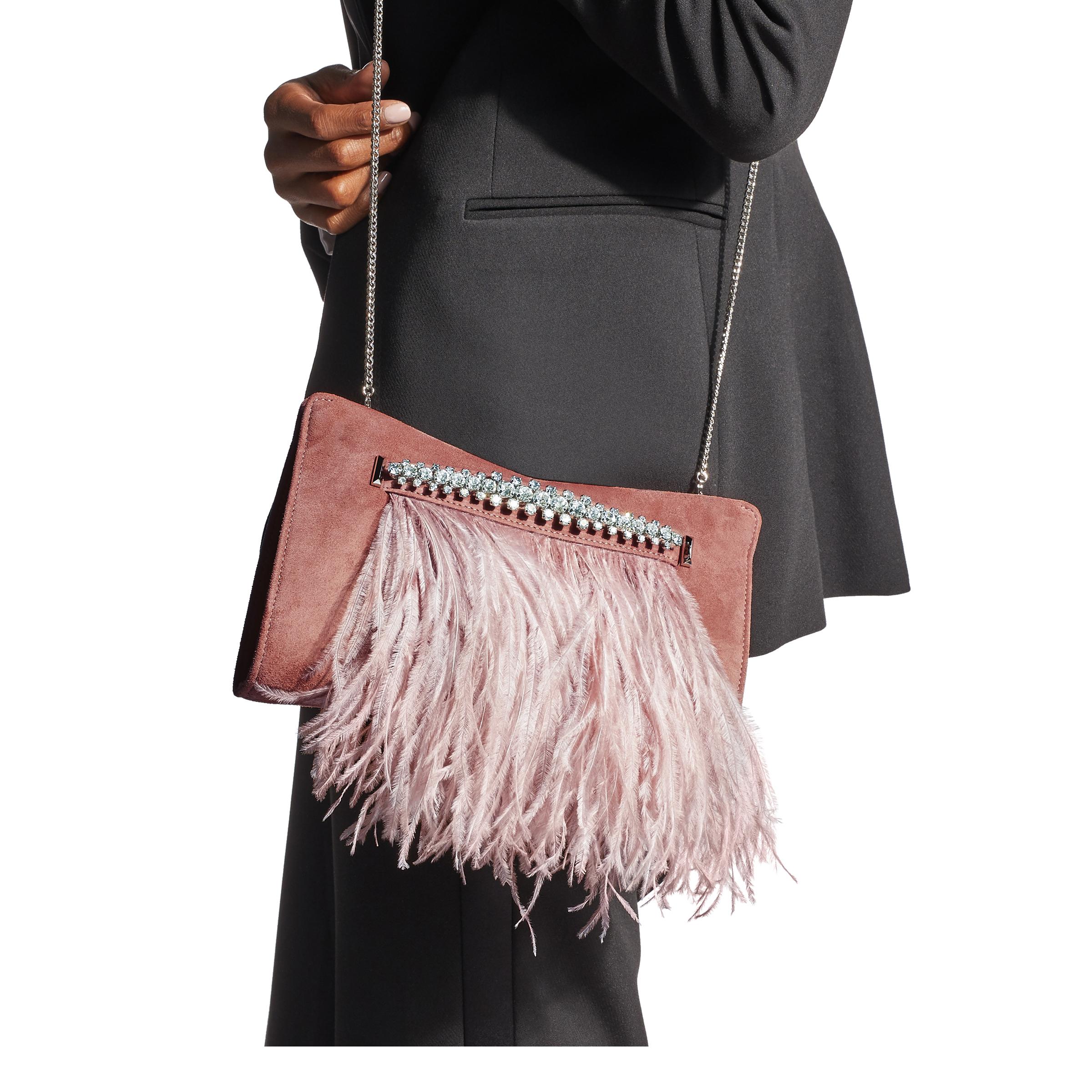 blush pink suede clutch bag