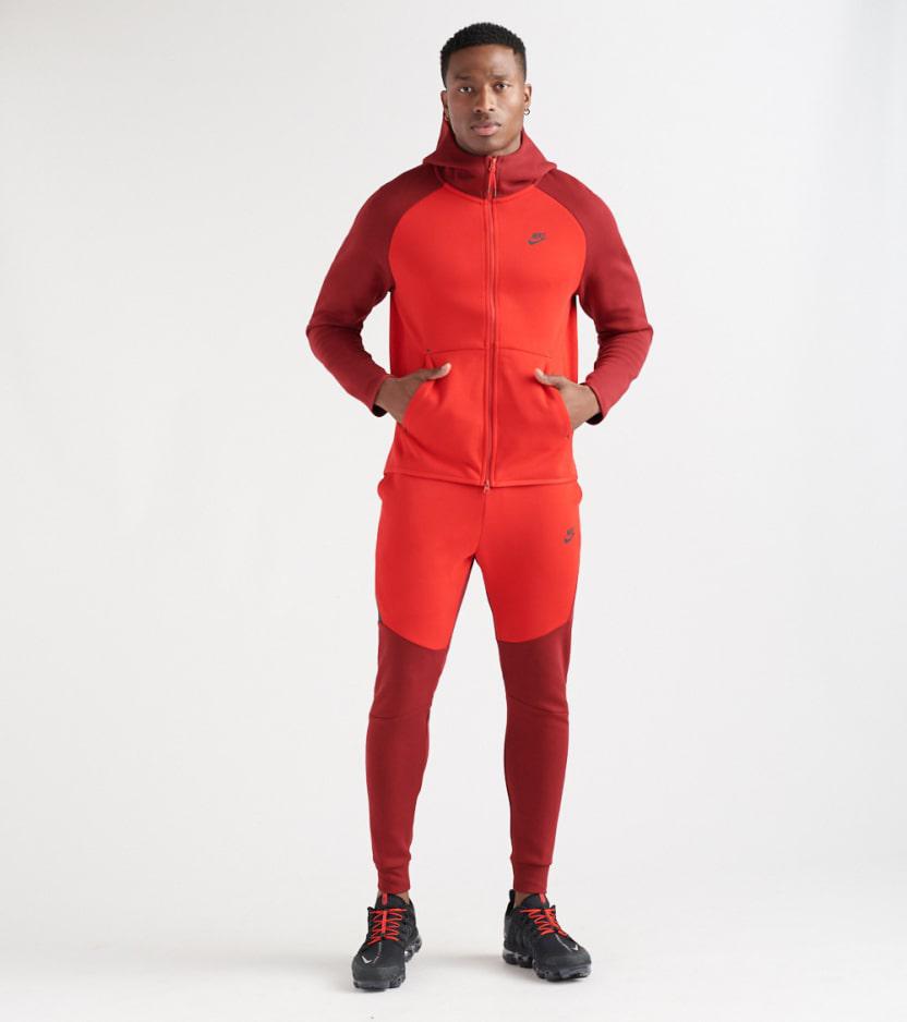 red nike tech suit