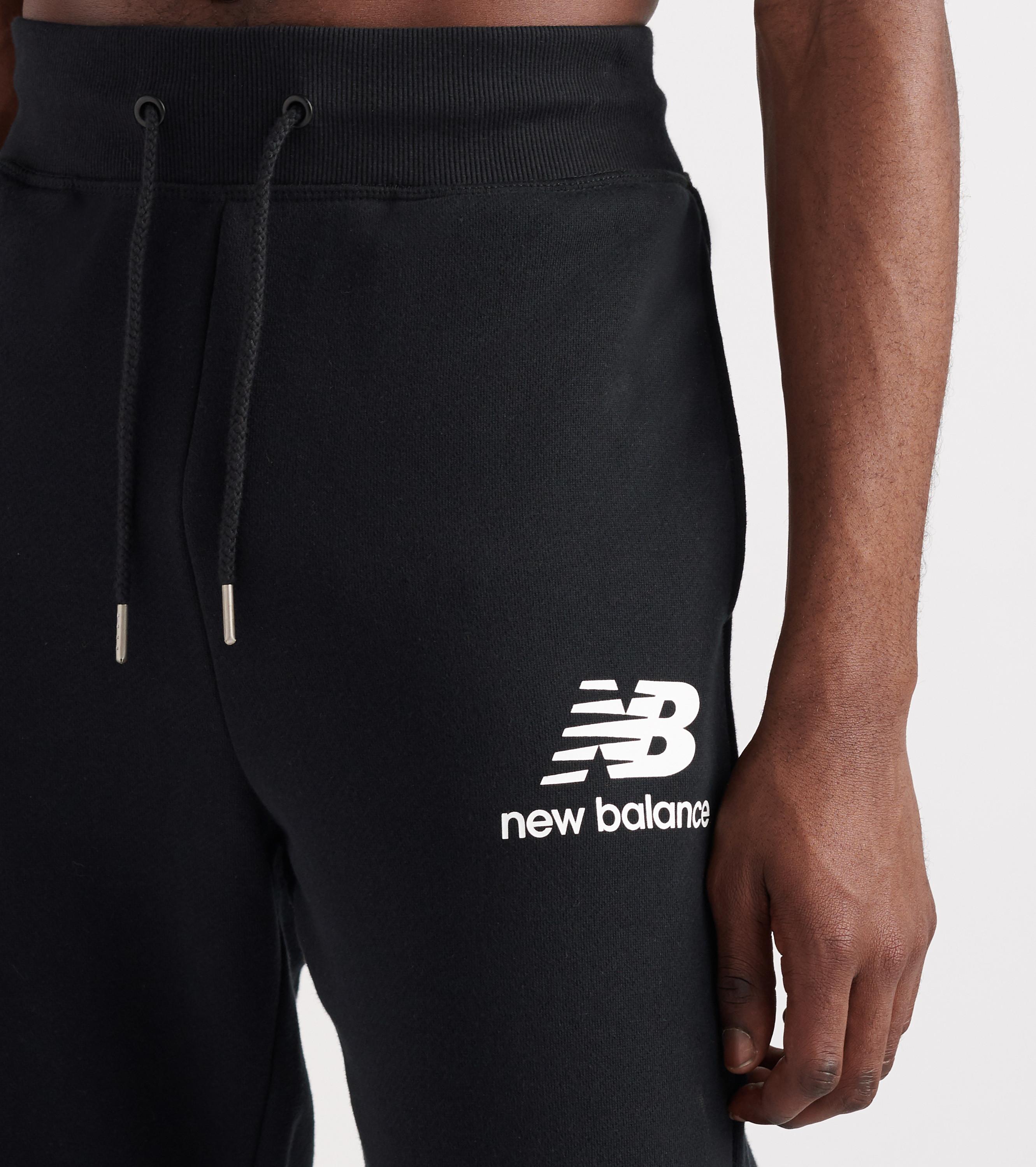 New Balance Cotton Essentials Logo Sweatpants in Black for Men - Lyst