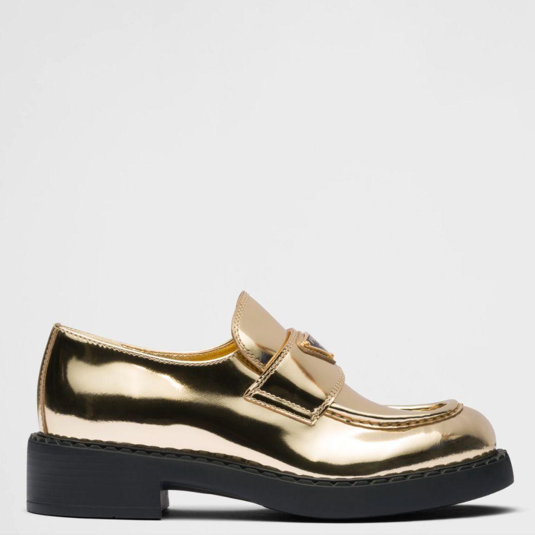Prada Metallic Loafers In Gold Lyst