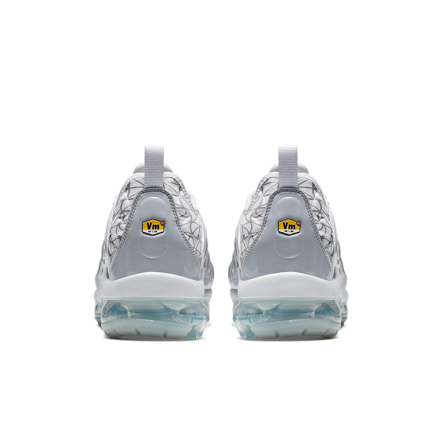 grey and white vapormax plus