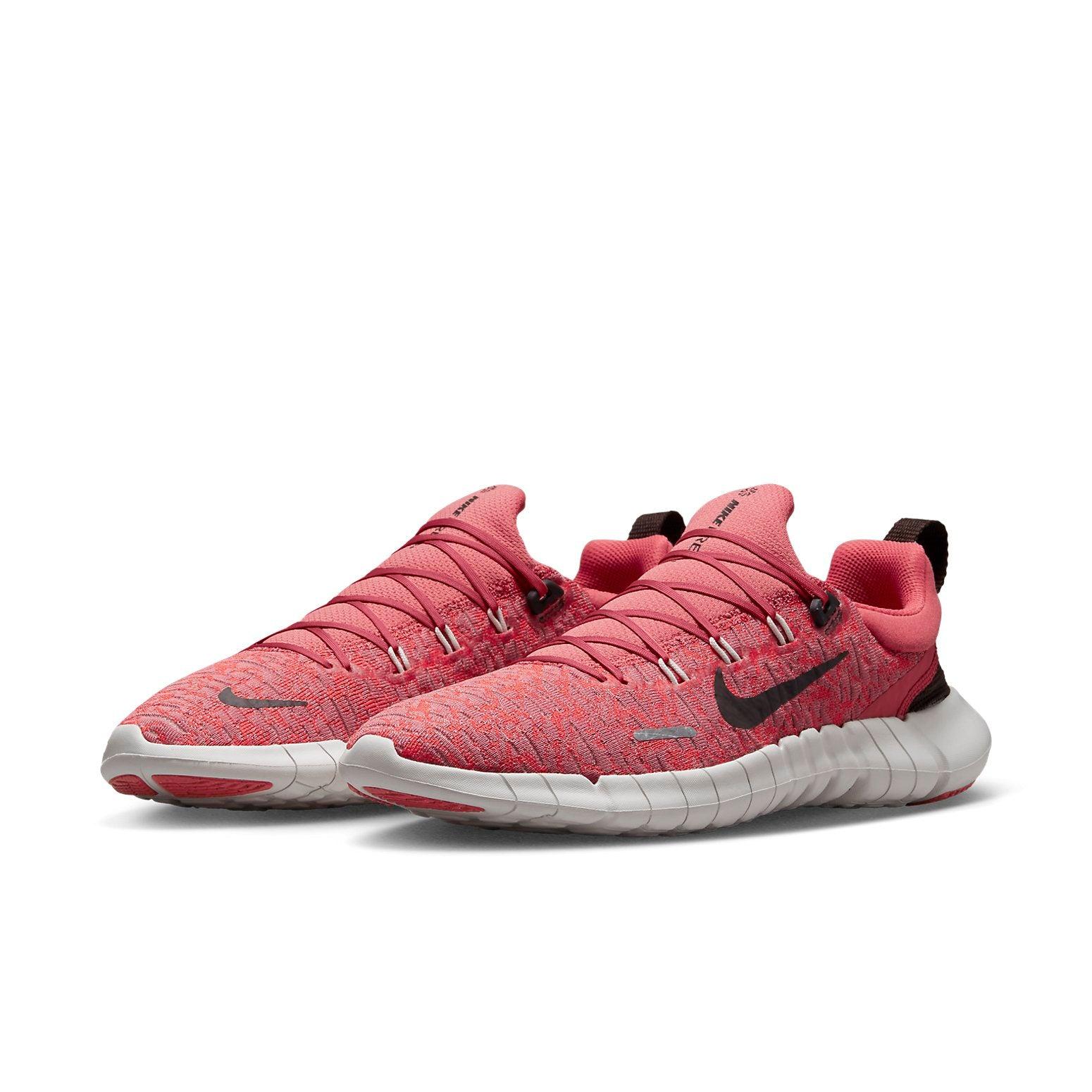 Pink nike free run sale