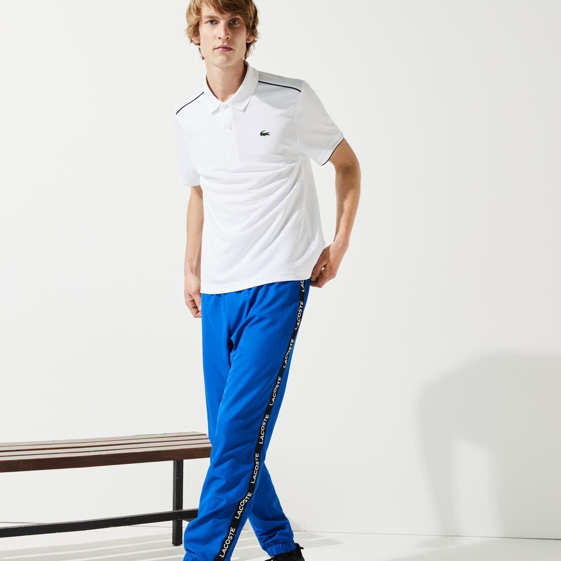 blue lacoste track pants