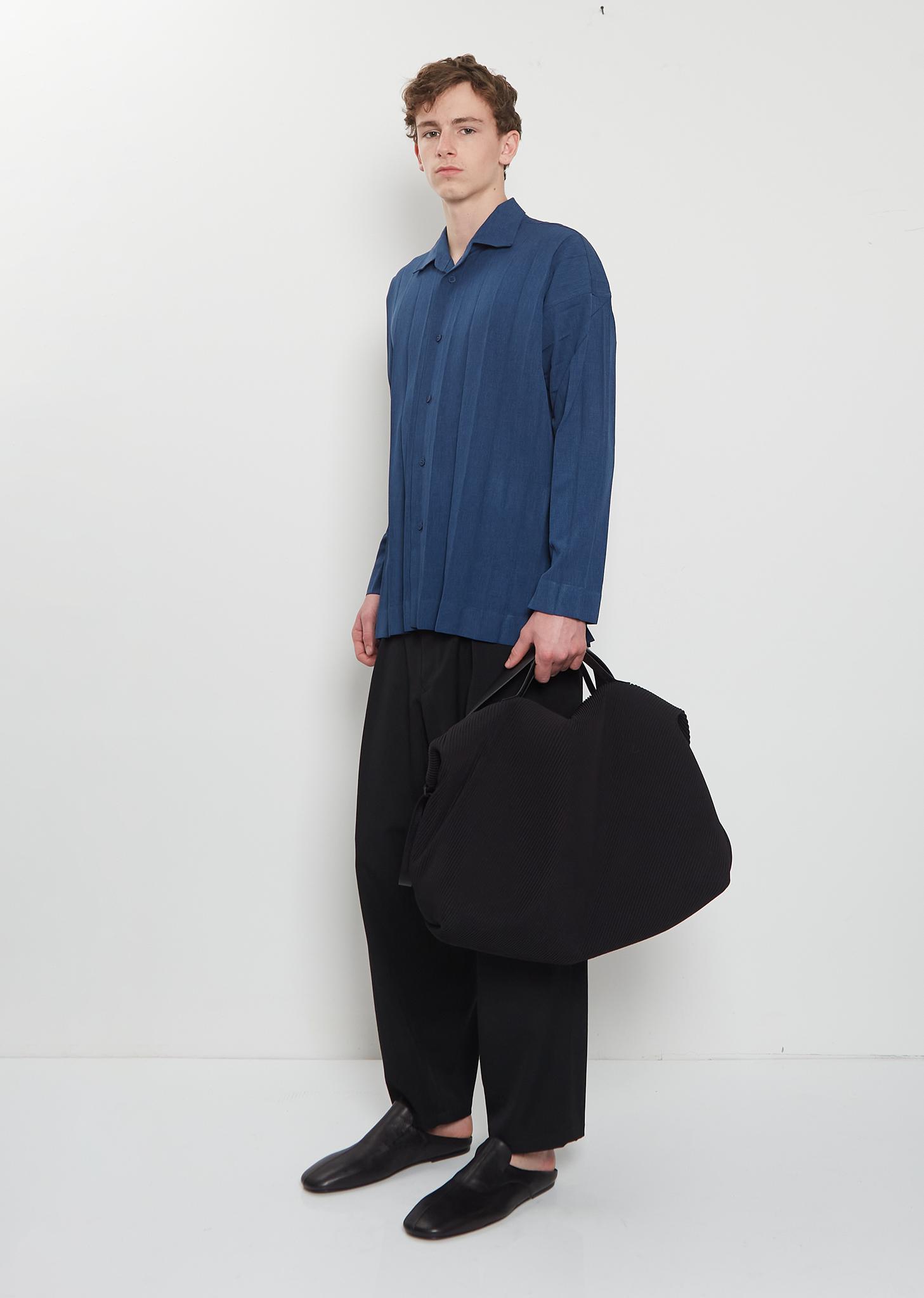 Homme Plissé Issey Miyake Travel Bag in Black | Lyst