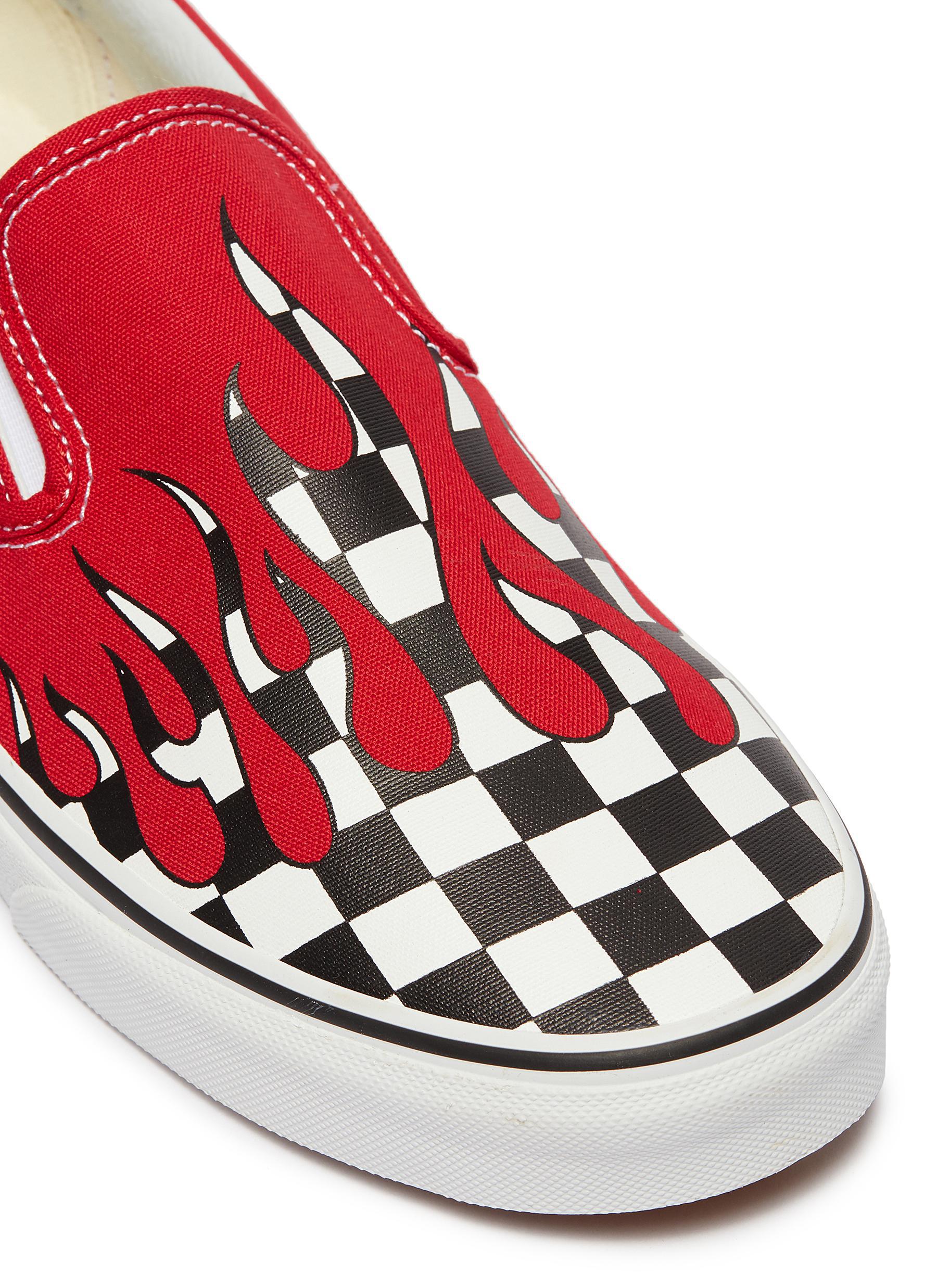 red slip on vans with flames