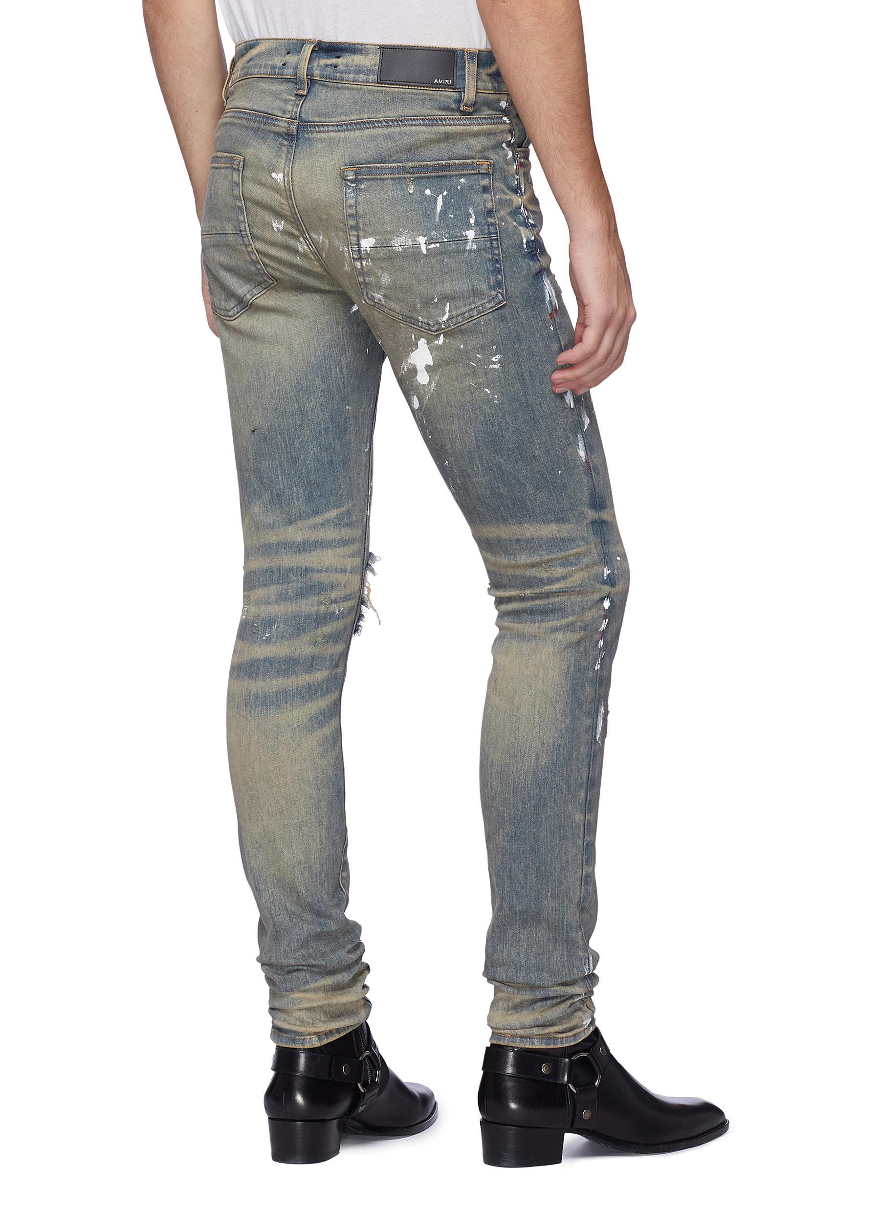 Amiri 'artist' Paint Splatter Ripped Skinny Jeans in Blue for Men | Lyst