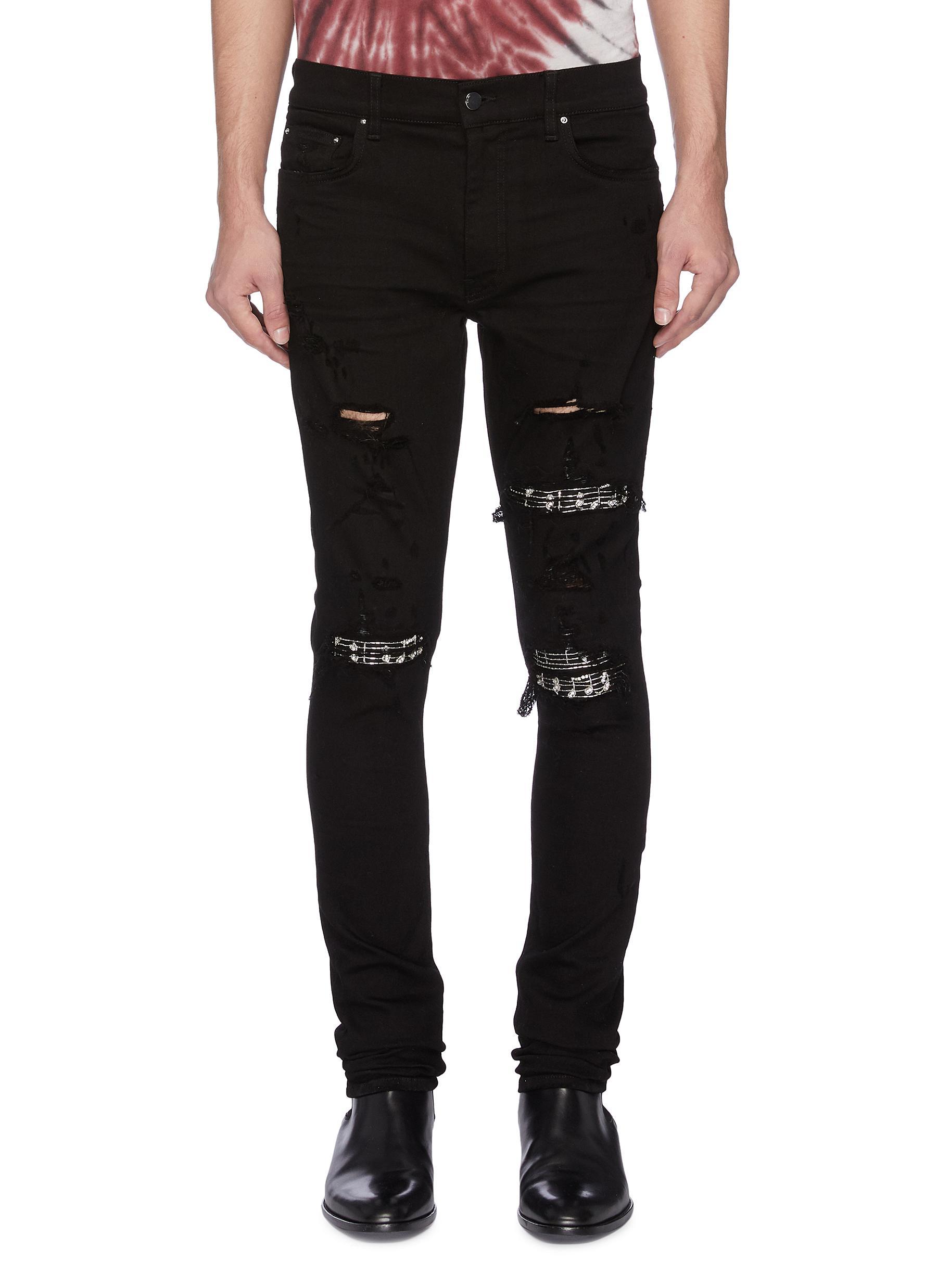 Amiri Denim Music Note Embroidered Panel Ripped Jeans in Black for Men ...