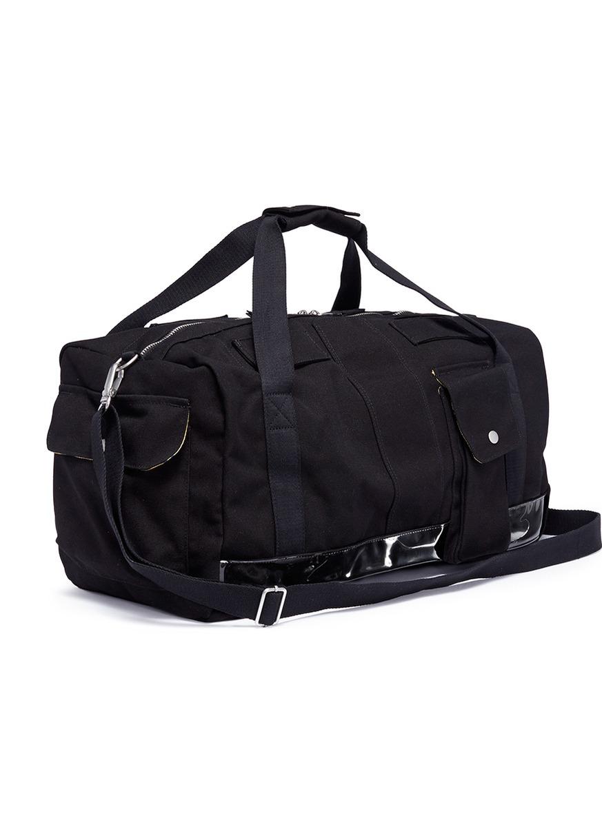 raf simons duffle bag