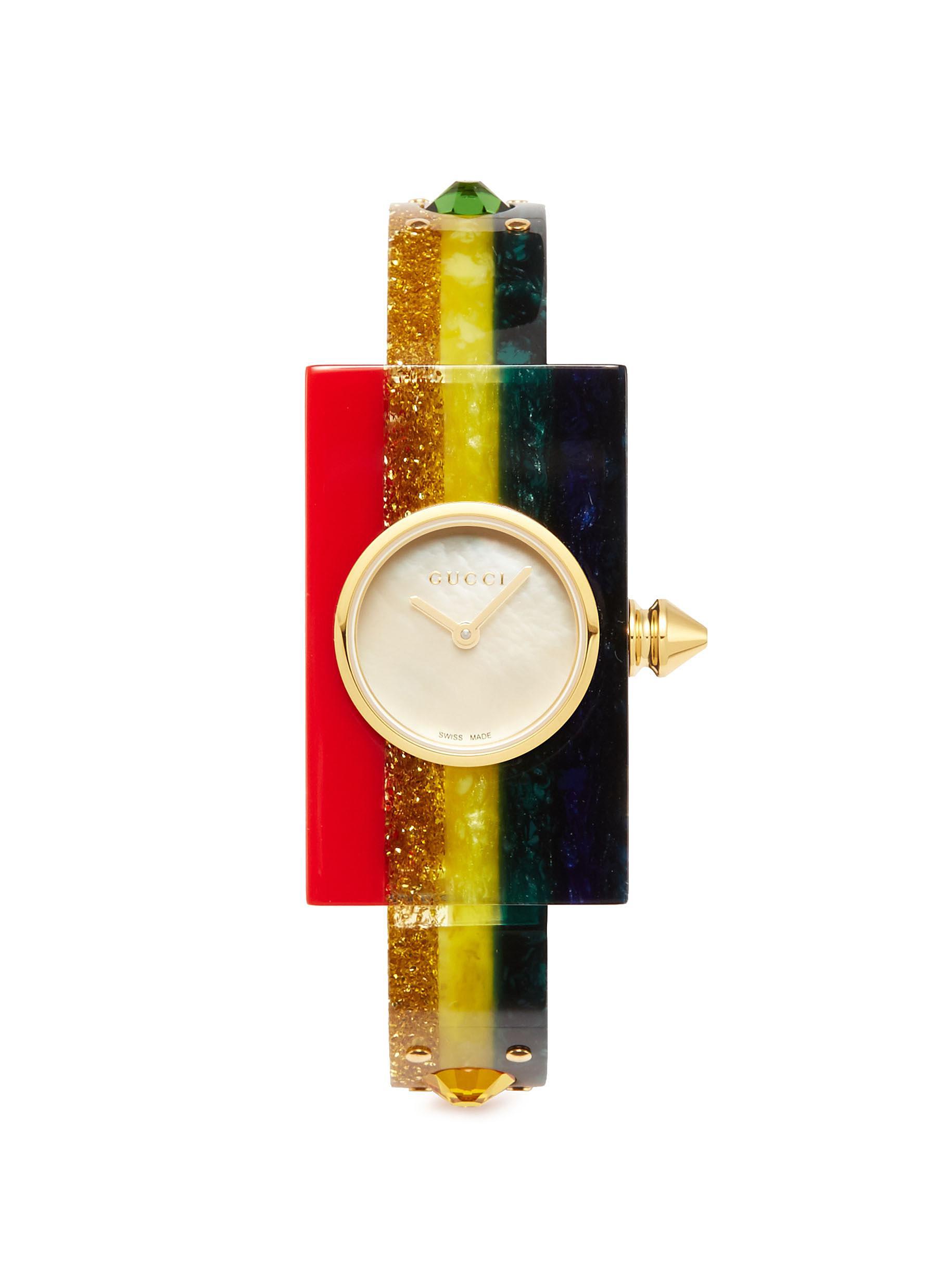 bangle watch with interchangeable bezels