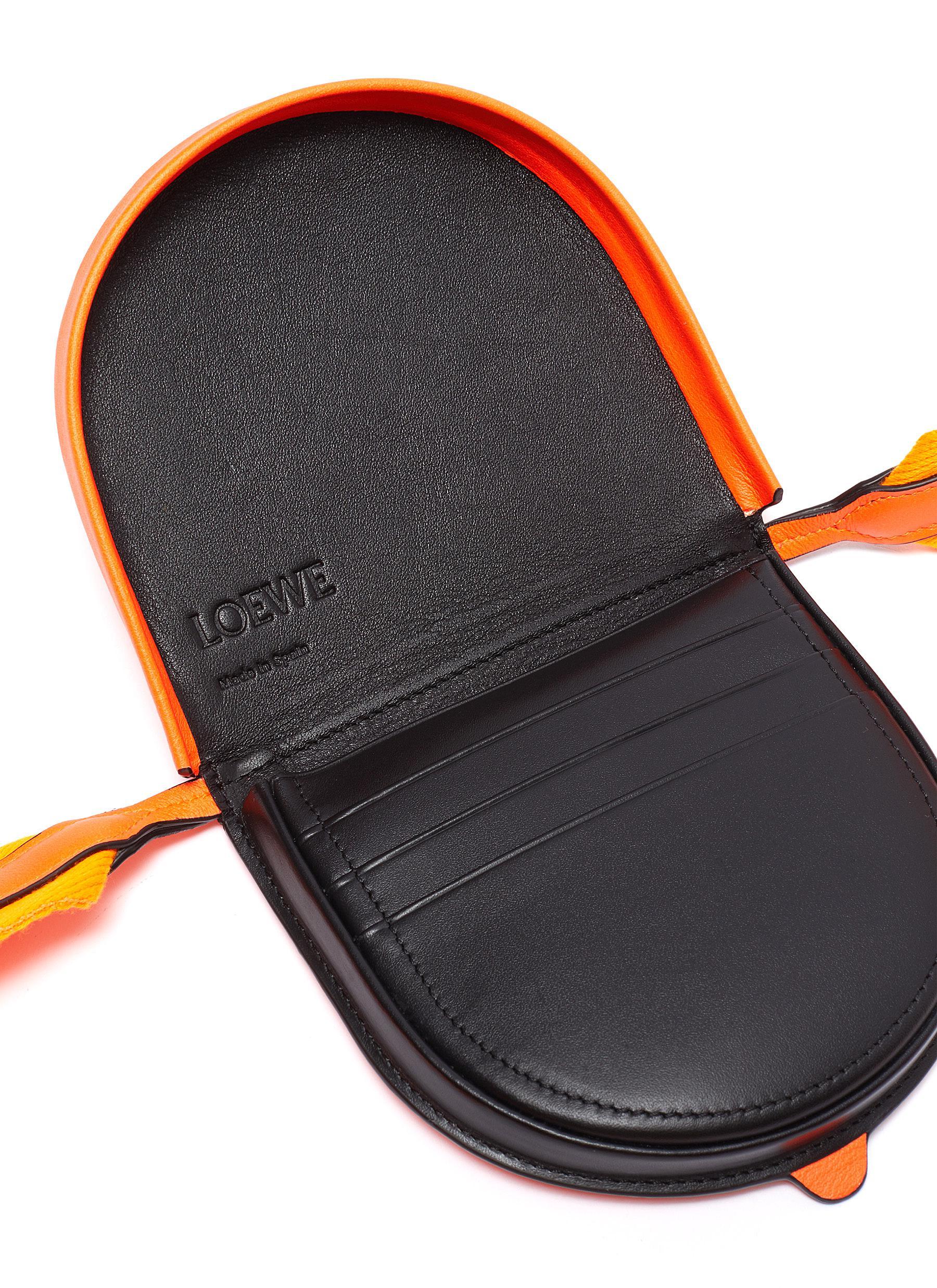small heel pouch in soft calfskin