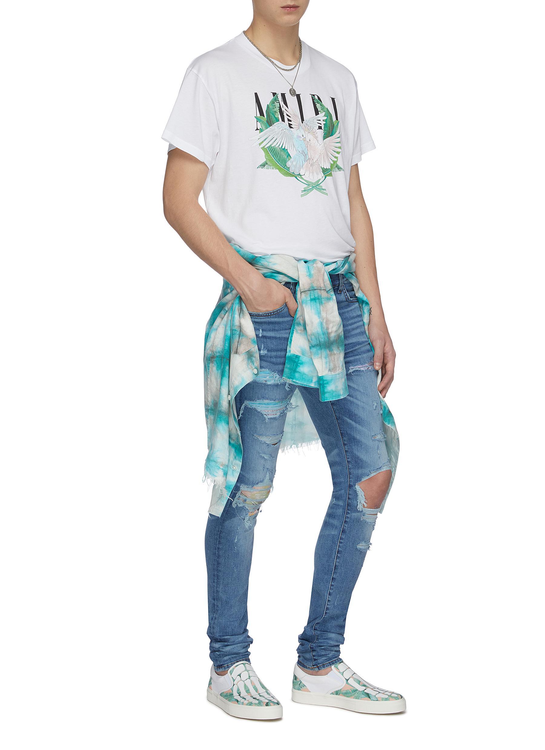 amiri hawaiian patch jeans