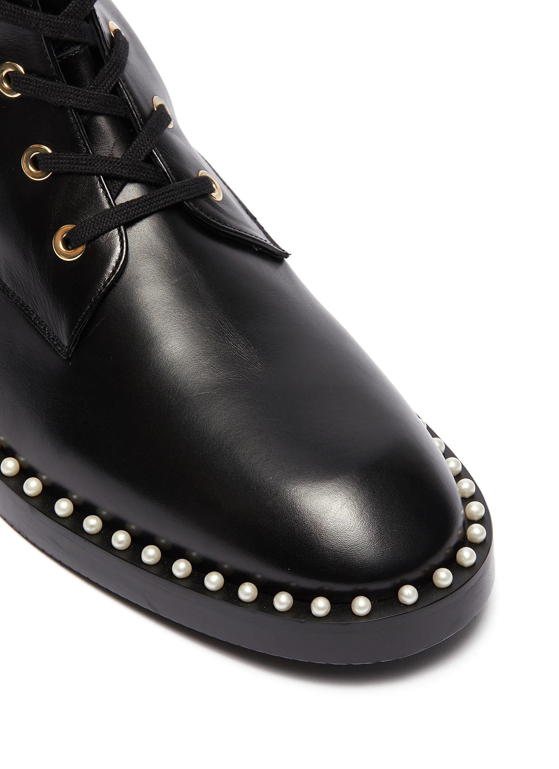 stuart weitzman sondra combat boot