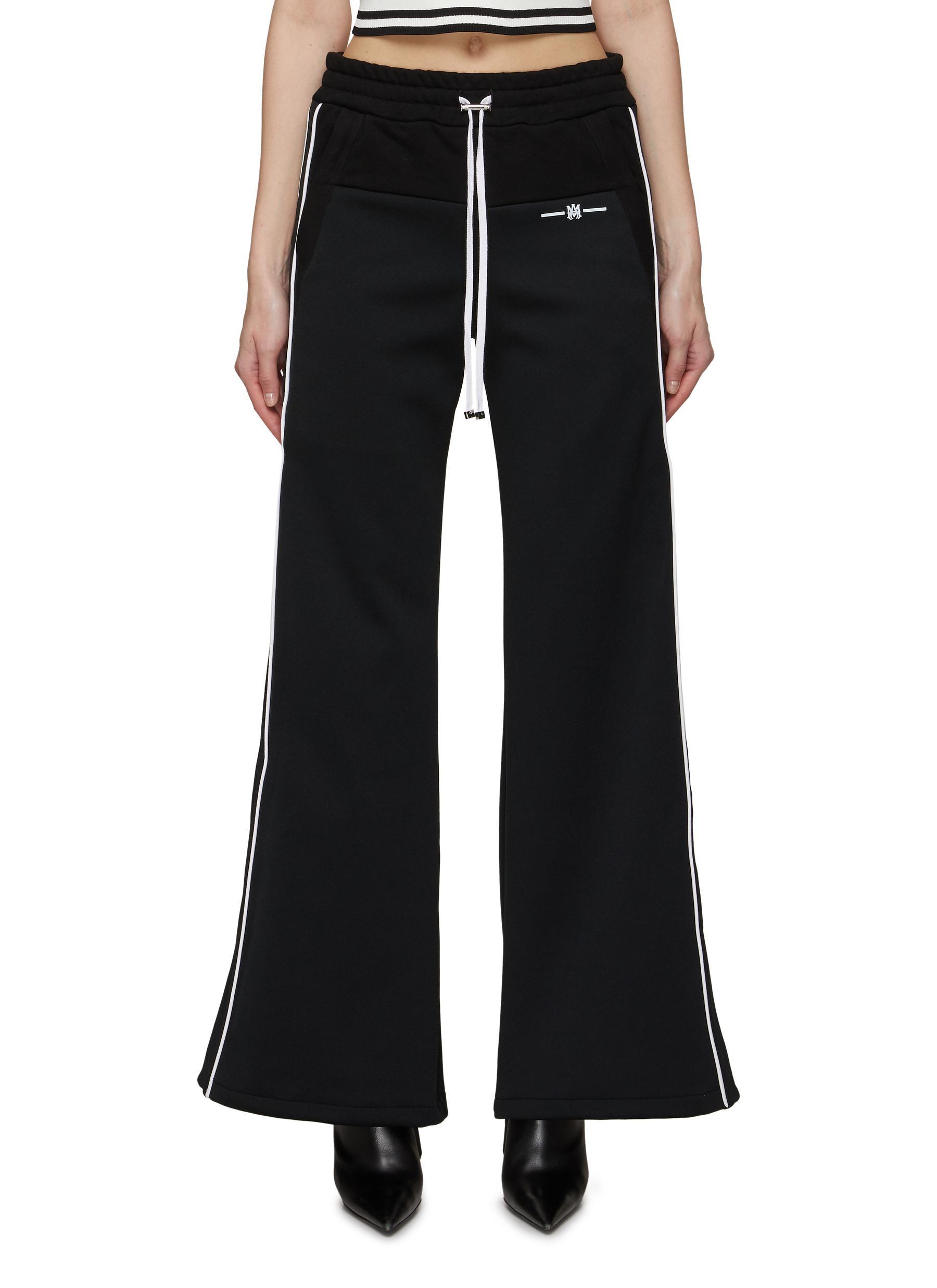 Amiri Wide Leg Contrast Side Stripe Track Pants in Black | Lyst UK