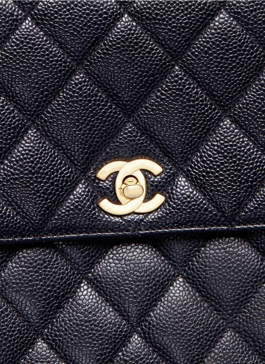 Chanel Kelly Caviar Leather Top Handle Bag in Black