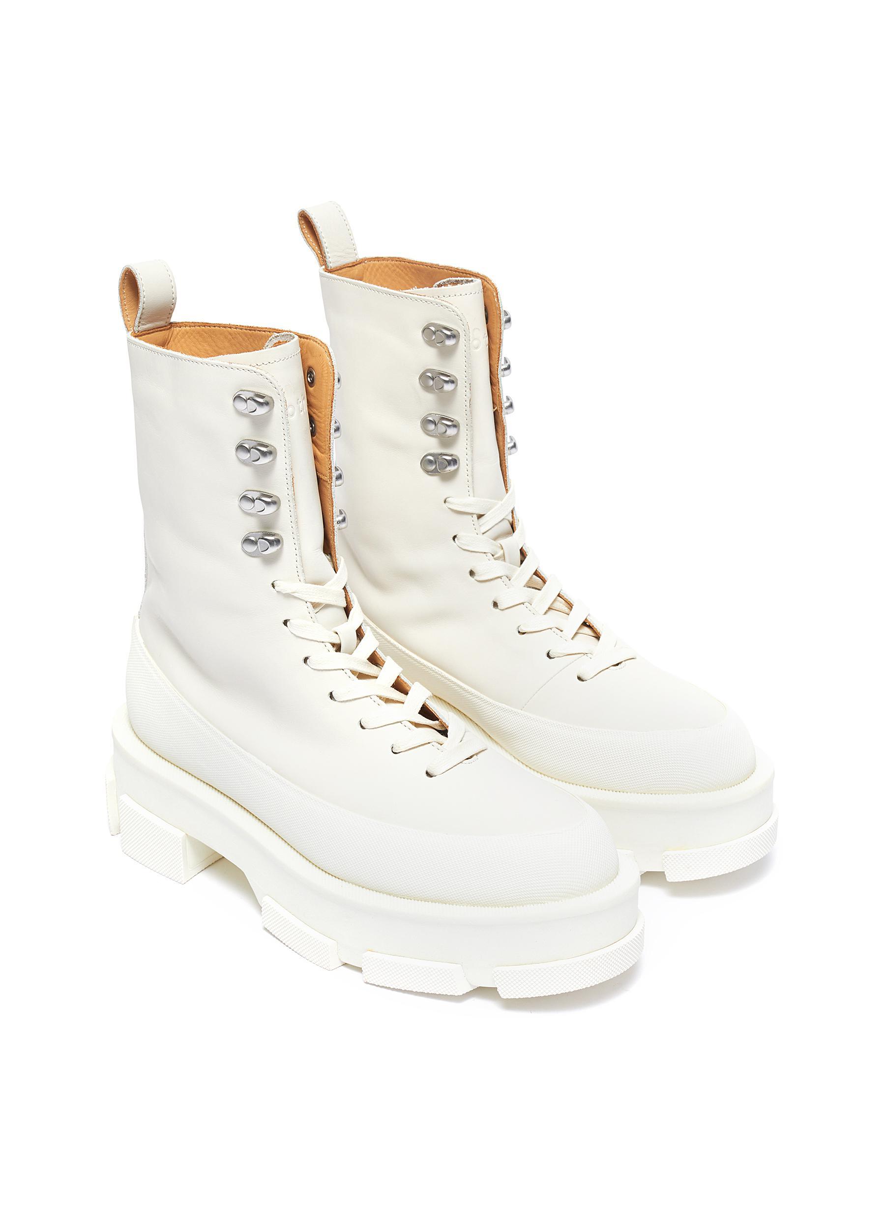 white combat boots with pouch
