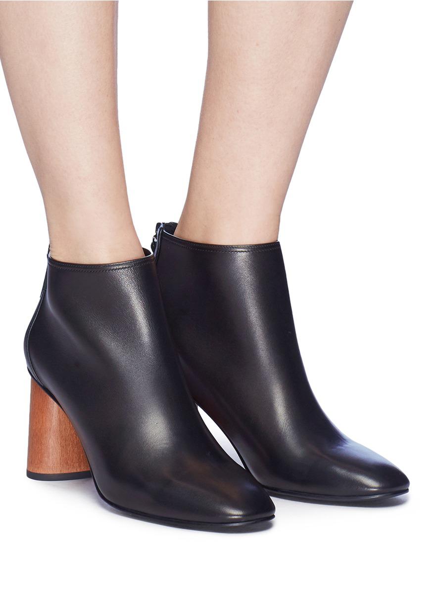 black booties wooden heel