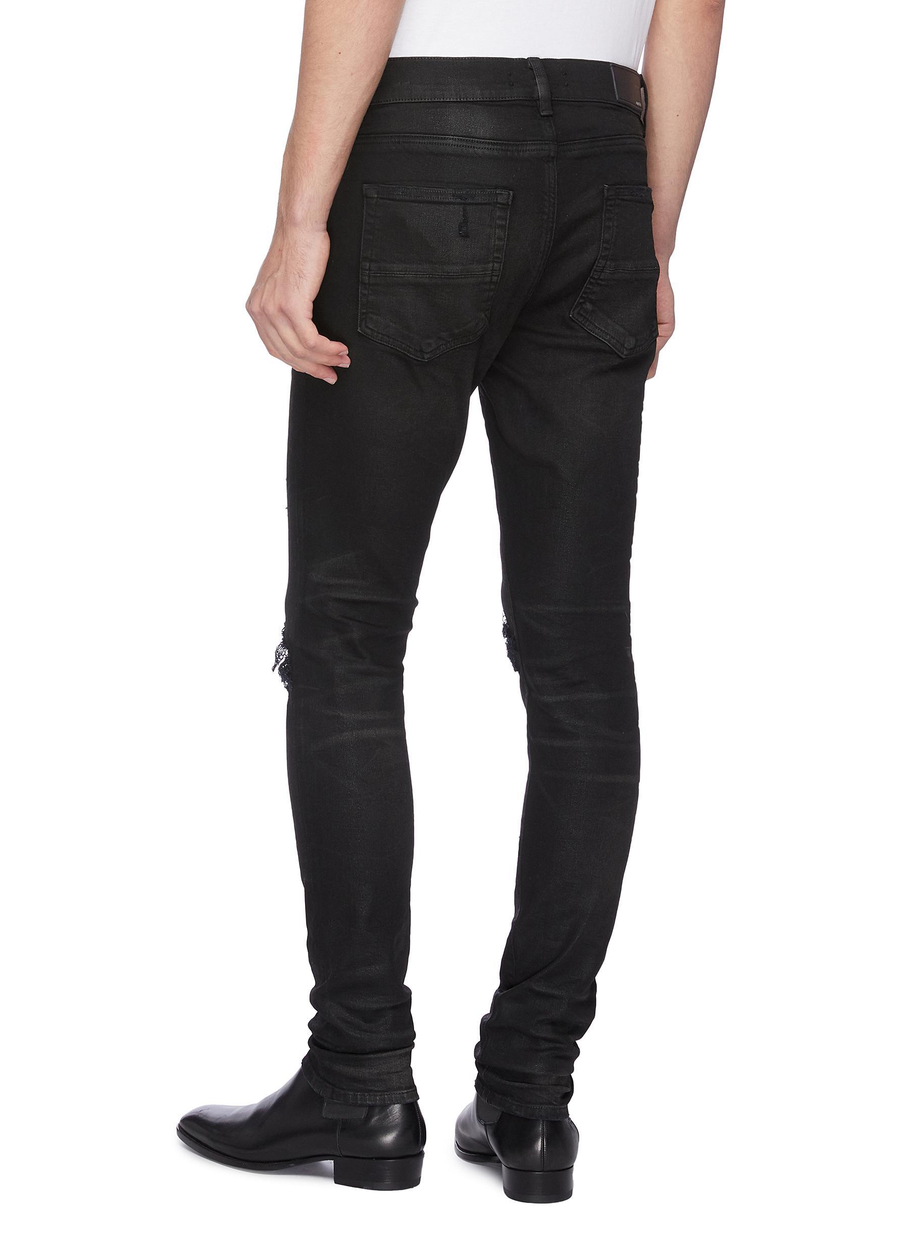 Amiri Denim 'thrasher Minimal' Ripped Jeans in Black for Men - Lyst