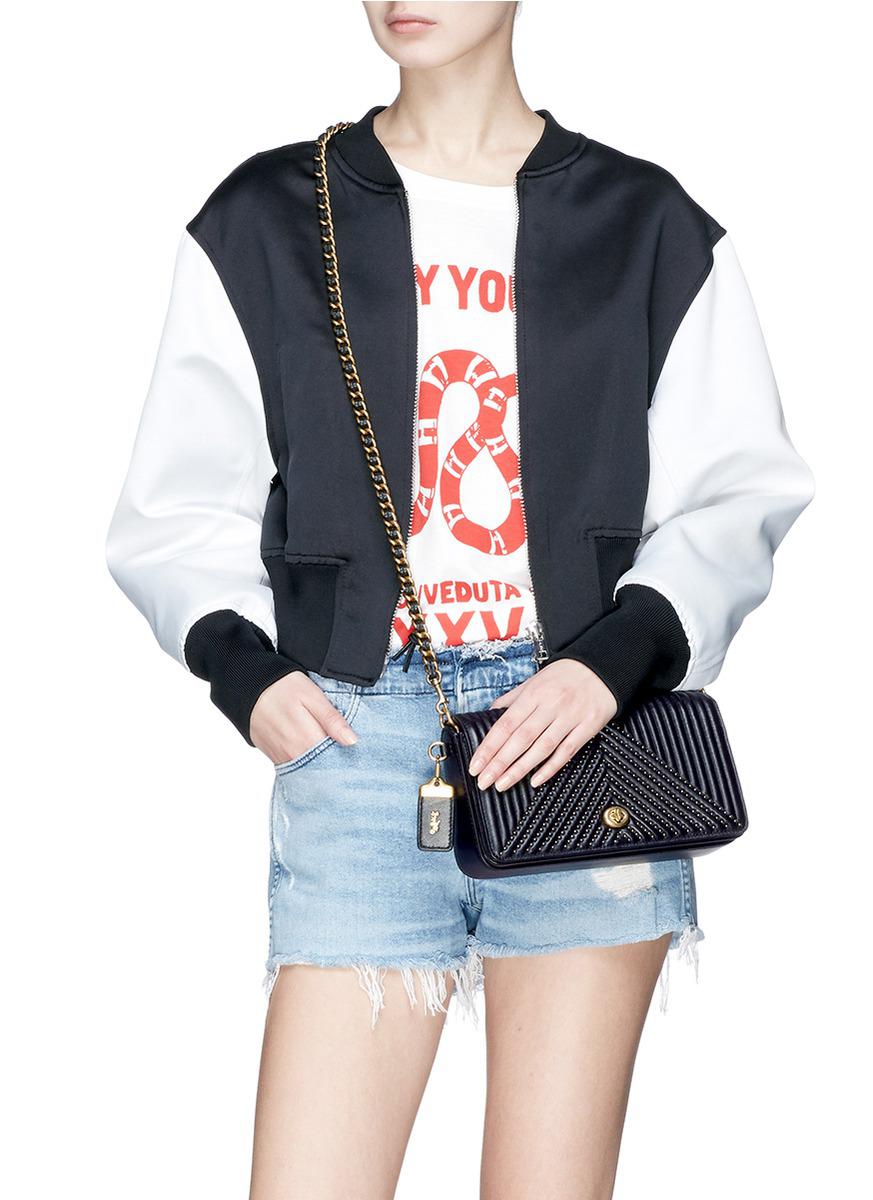 COACH dinky Rivet Quilted Leather Crossbody Bag in Black Lyst