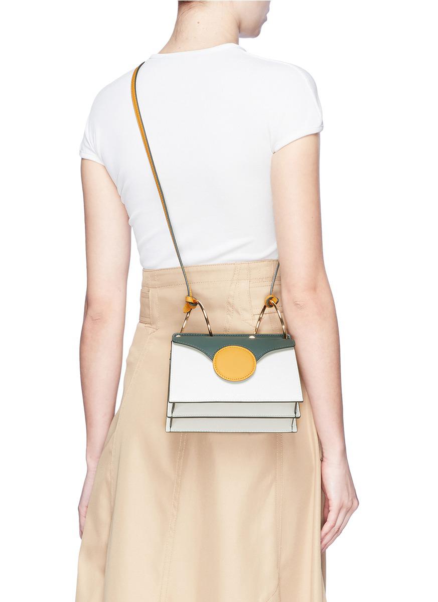 danse lente mini phoebe leather shoulder bag