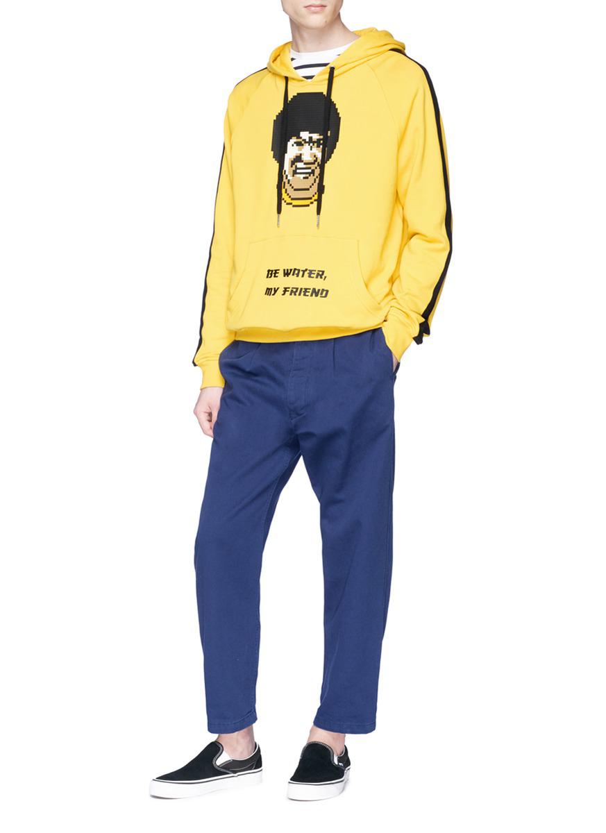 bruce lee yellow sweatshirt