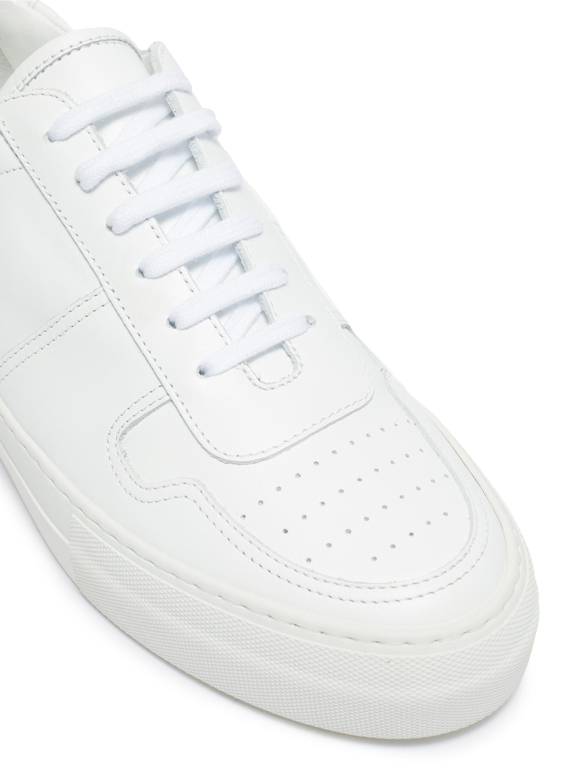 Common Projects Track 90 Sneakers In White | ModeSens