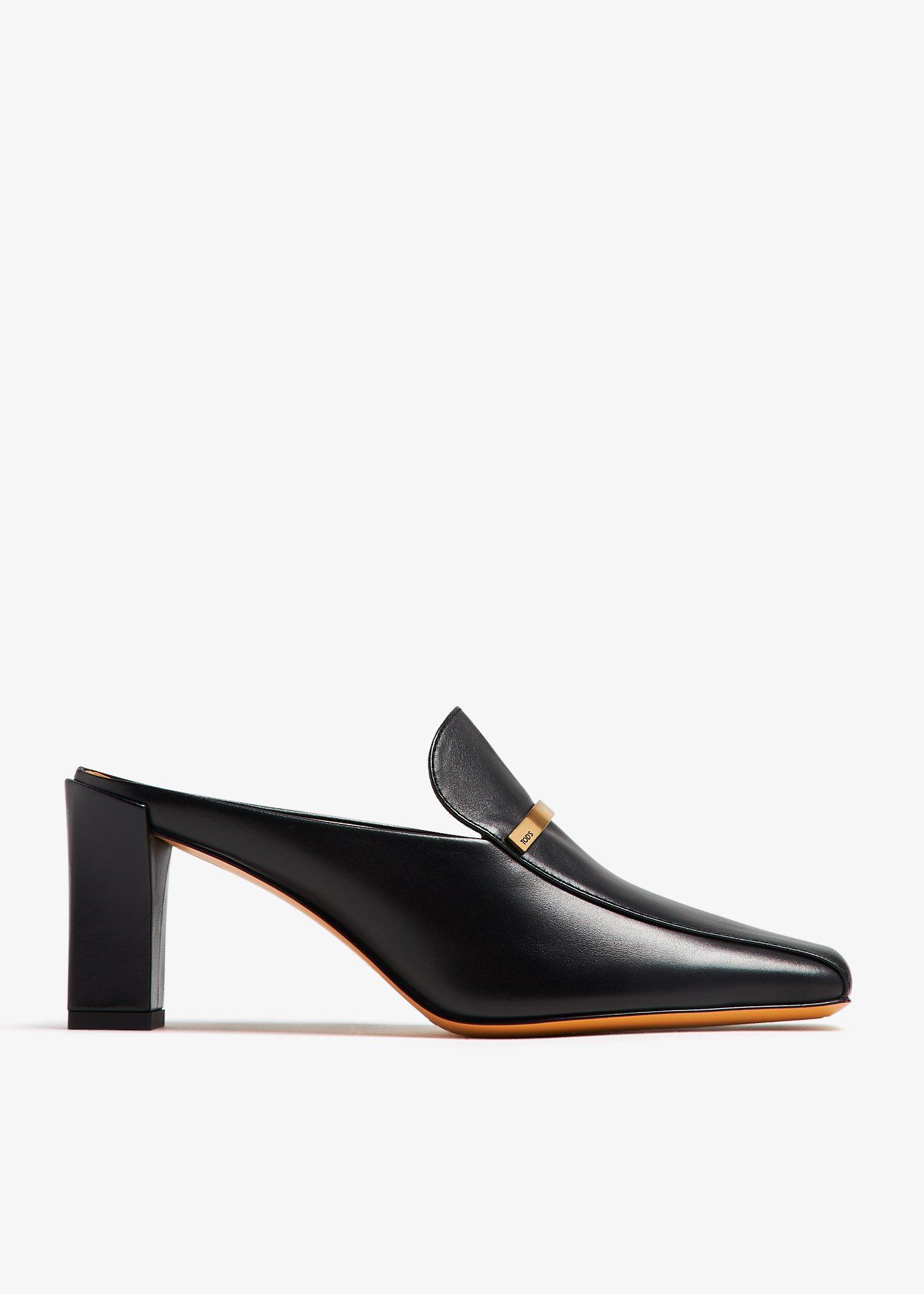 tods-Black-Leather-Mules.jpeg