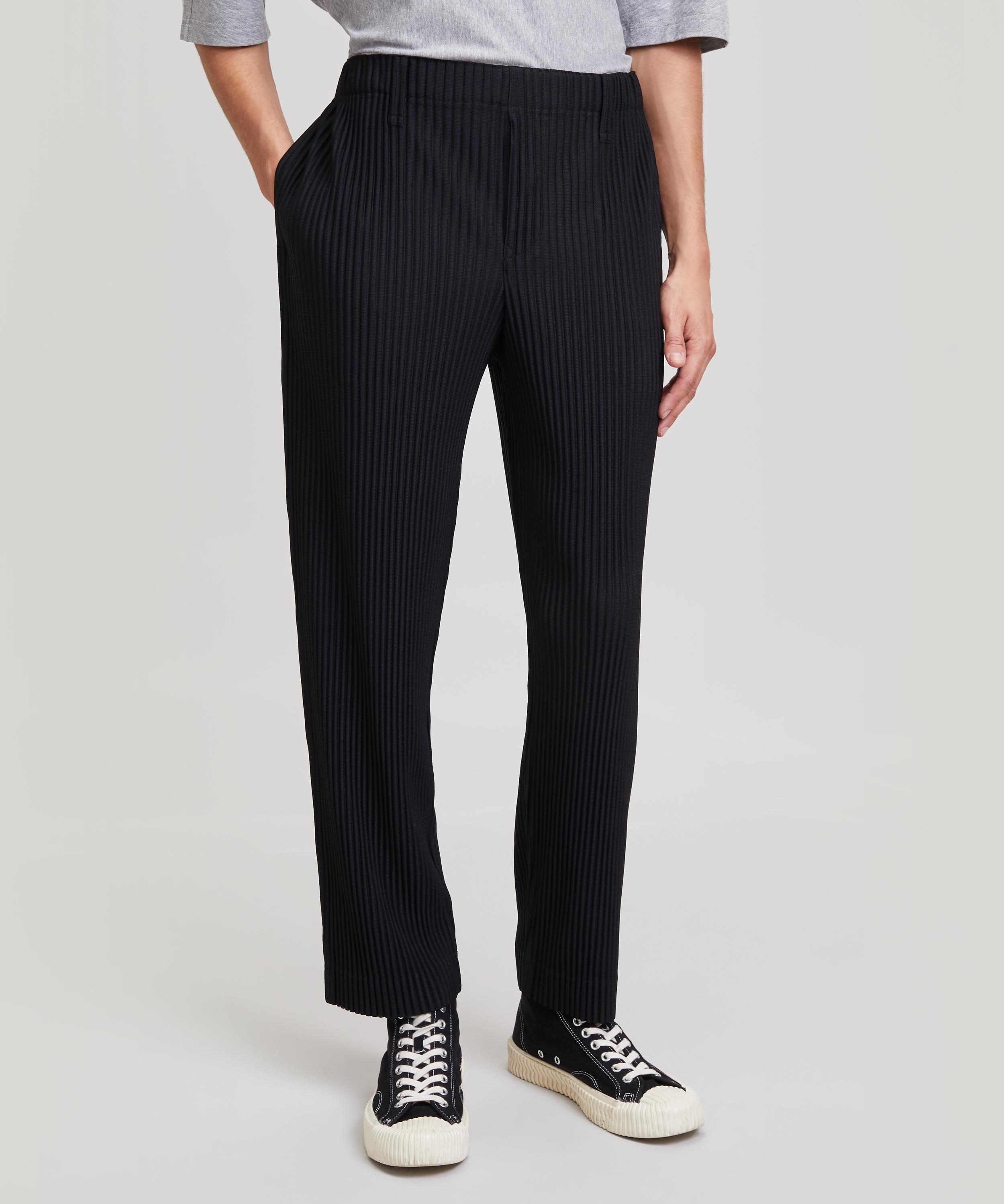 Homme Plissé Issey Miyake Cotton Core Tapered Pleated Trousers in Black ...