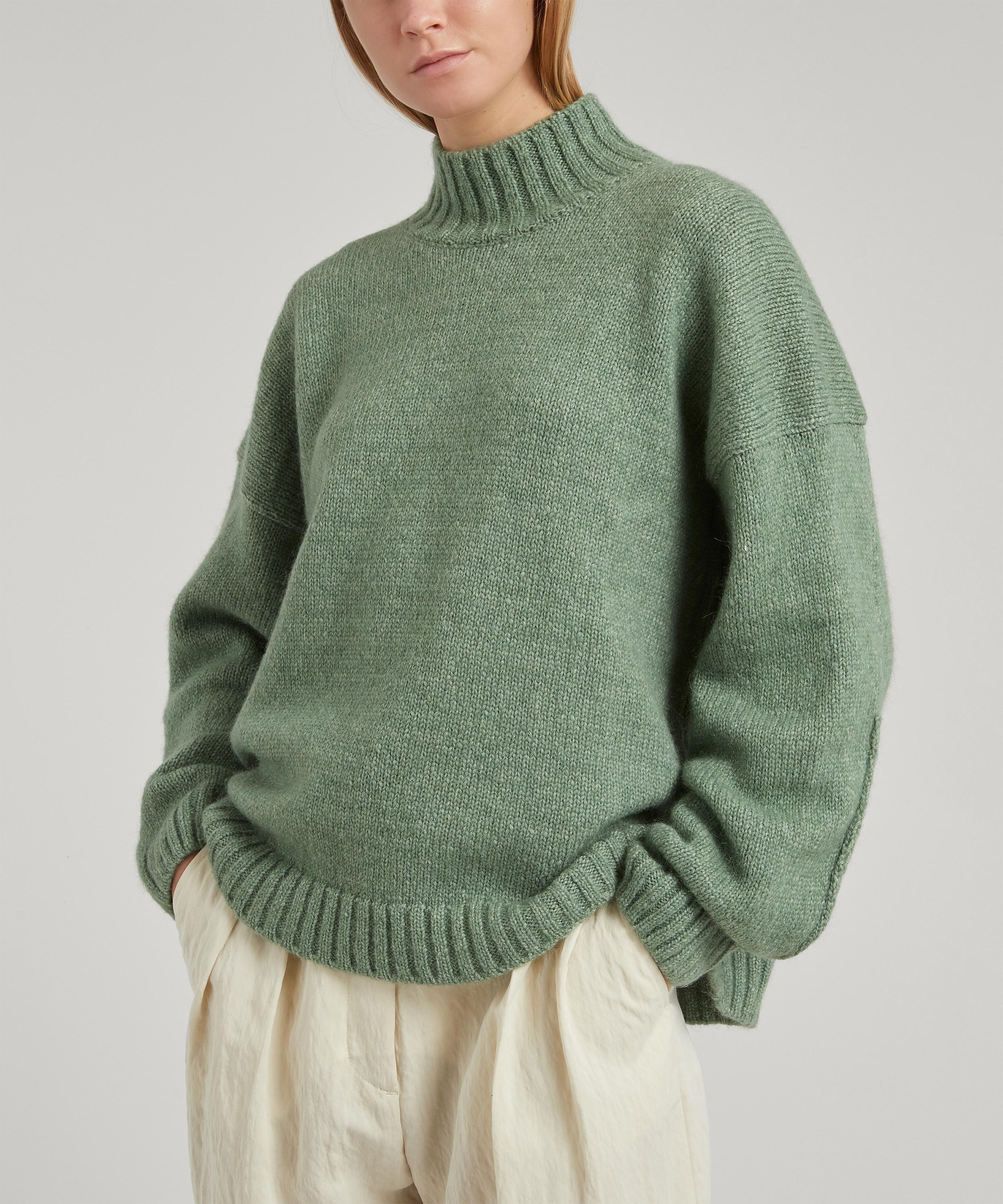 green wool jumper
