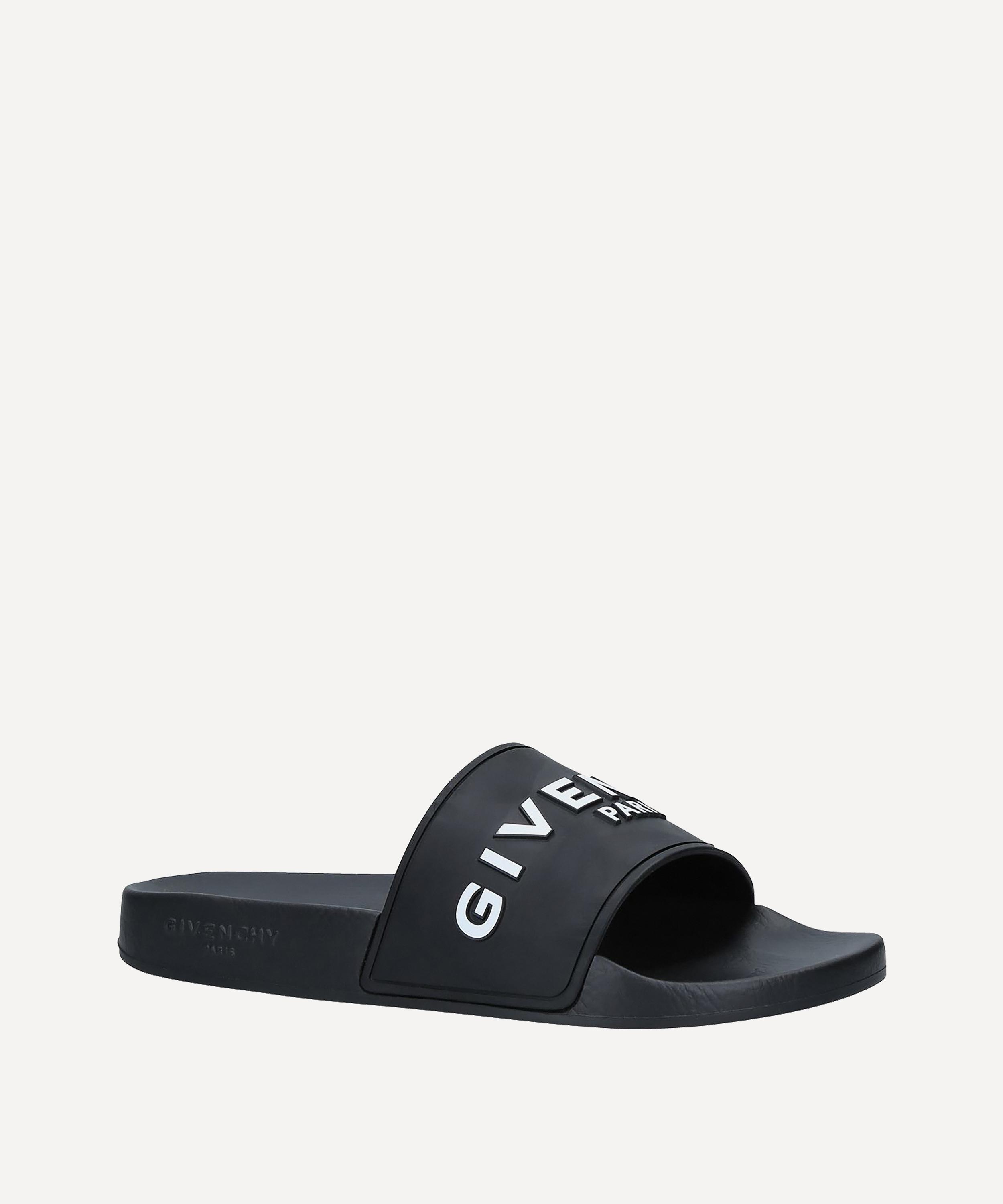 Givenchy Logo Rubber Sliders in Black - Lyst