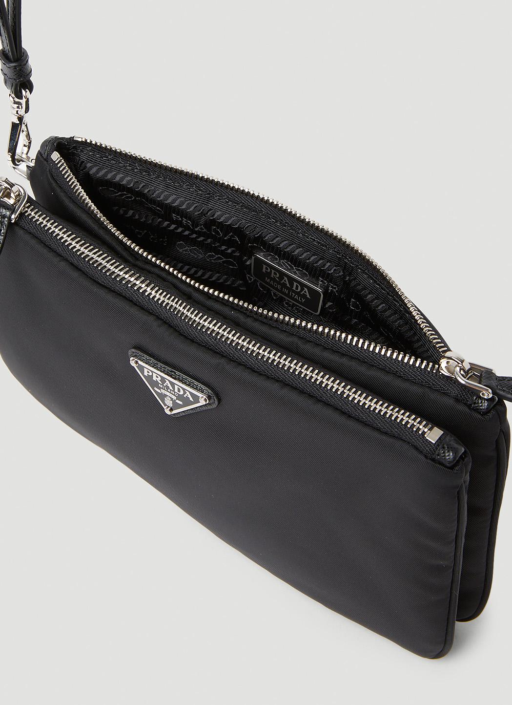 Prada logo plaque clutch bag outlet