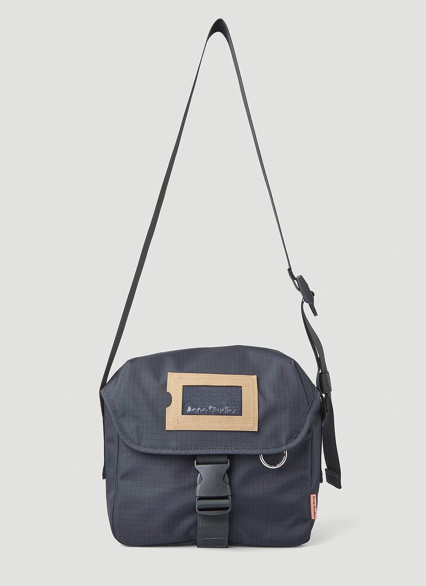 Logo-Embossed Suede-Trimmed Nylon-Ripstop Messenger Bag