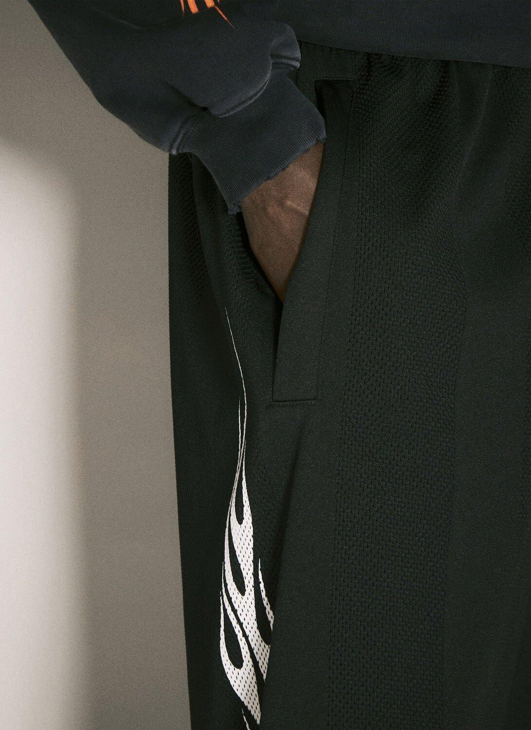 Balenciaga Burning Unity Baggy Trackpants in Black for Men Balenciaga Burning Unity Baggy Trackpants in Black for Men