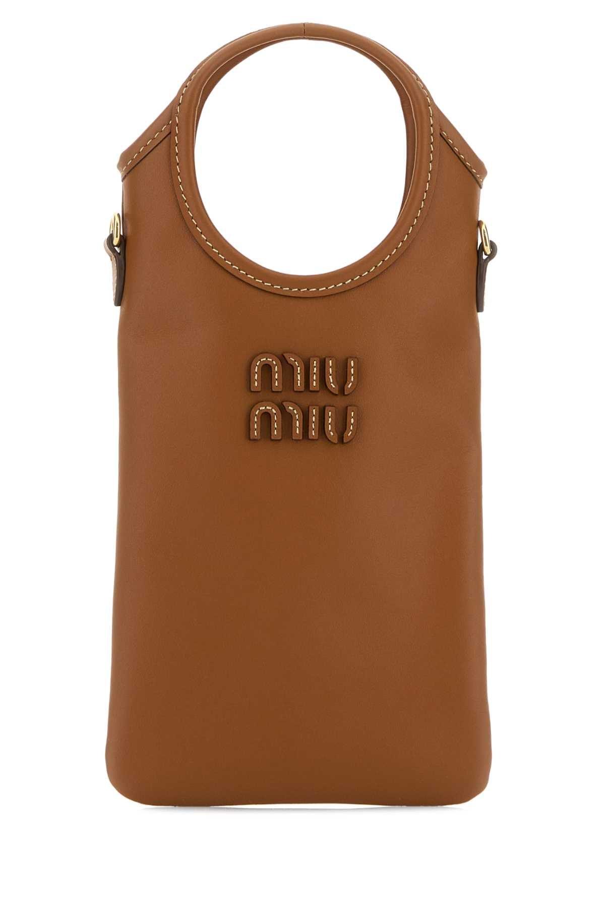 Miu Miu Phone cases for Women | Online Sale up to 46% off | Lyst
