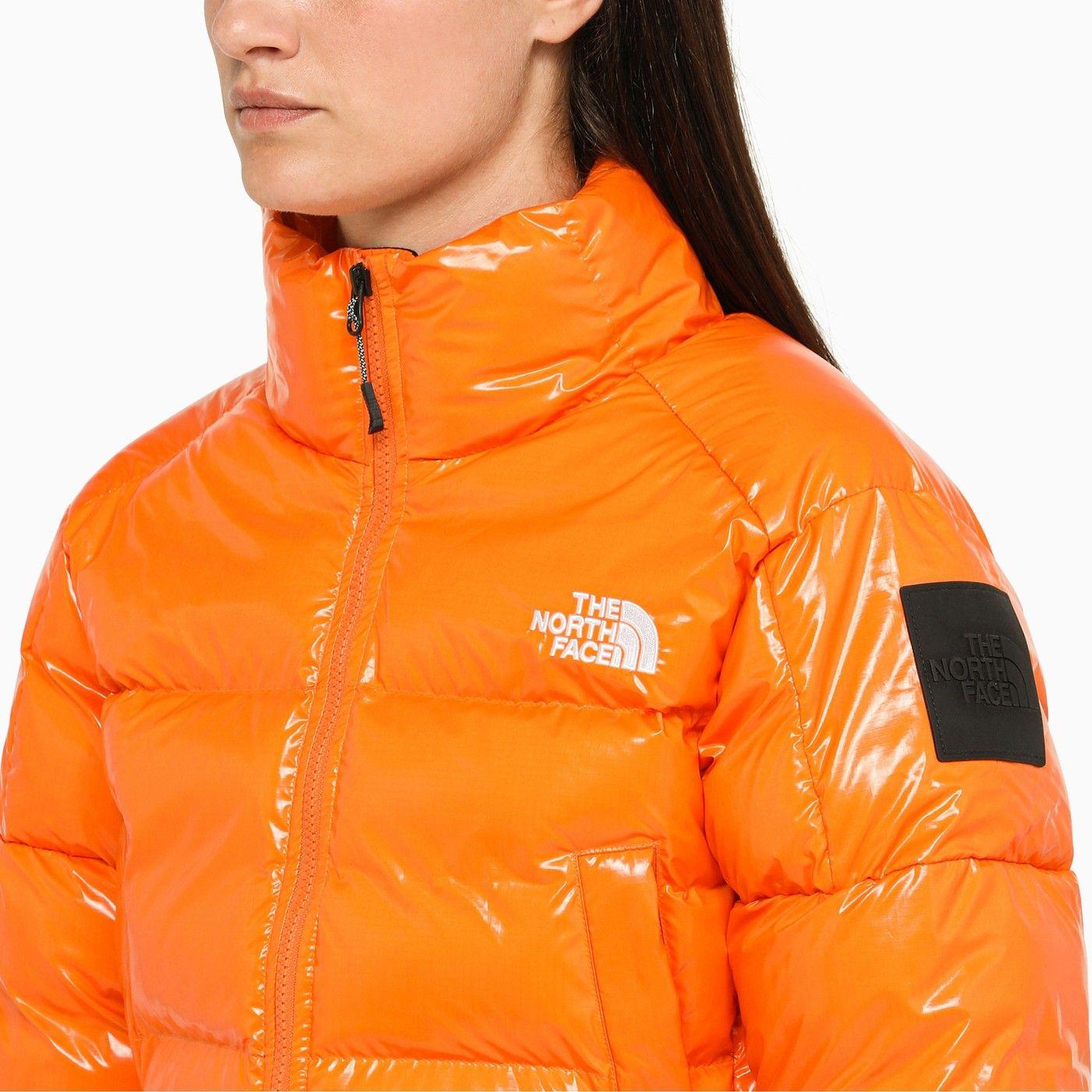 North face orange best sale puffer