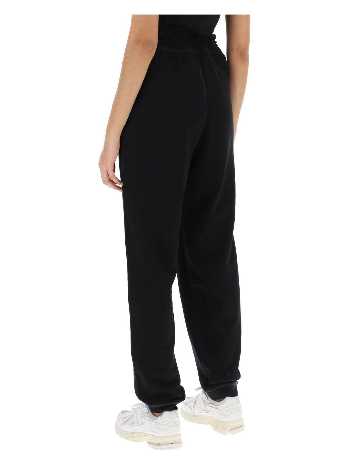 Ganni Track pants and sweatpants for Women | Online Sale up