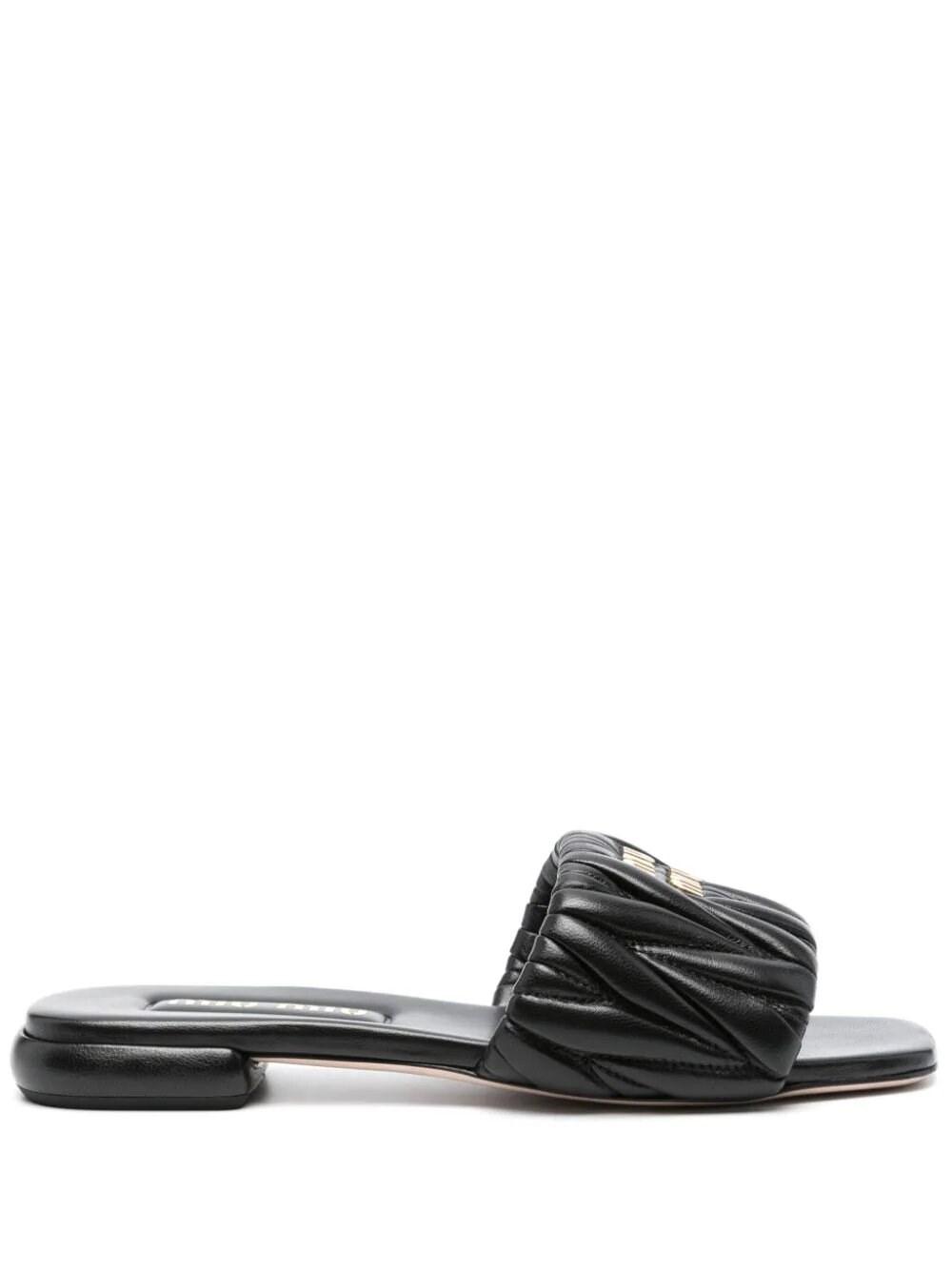 【MIU MIU】MATELASSE SANDALS Miu Miu Matelassé logo-plaque Sandals | Neutrals | FARFETCH