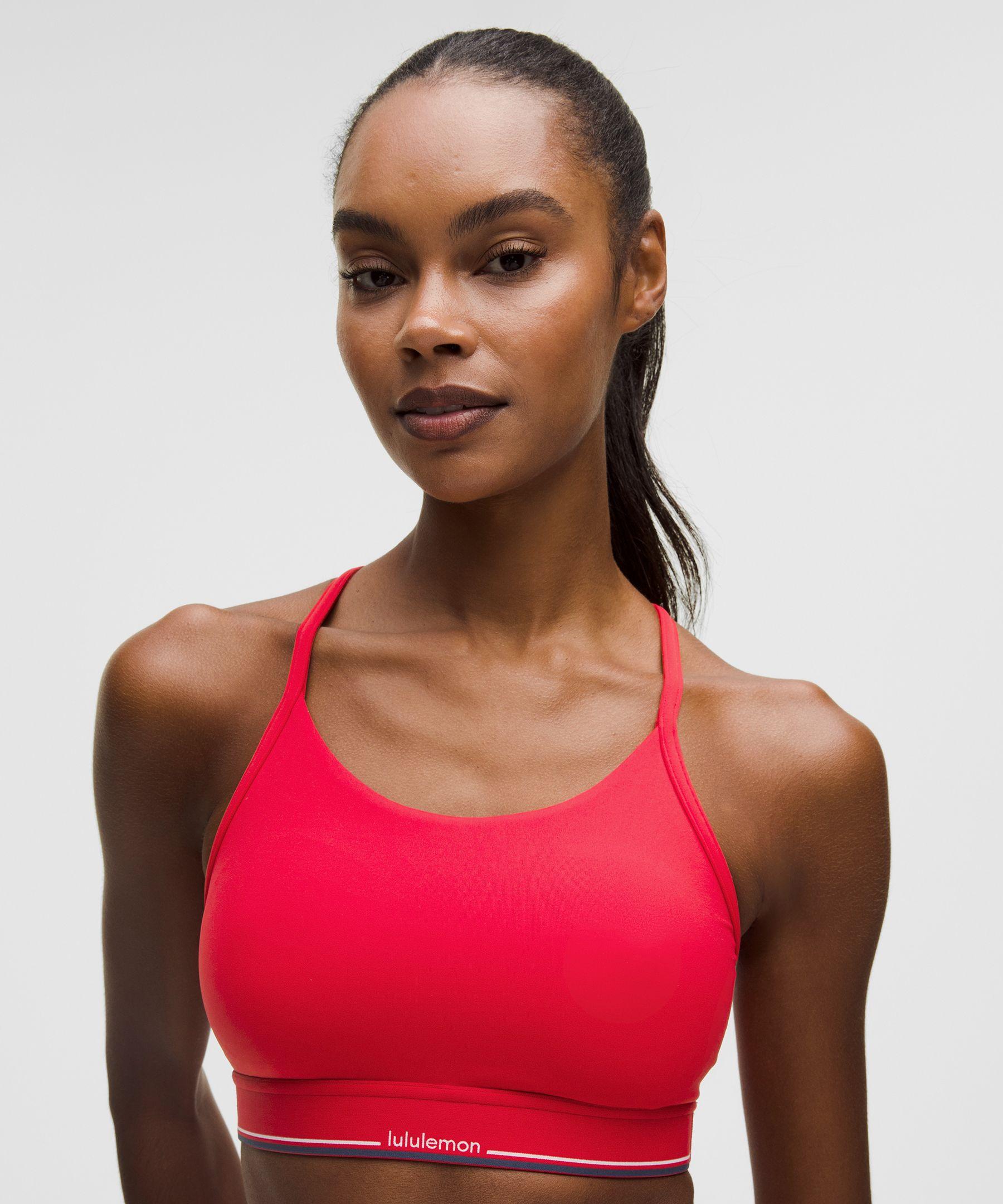 lululemon Flow Y Mid-Support Bra Logo in Red | Lyst