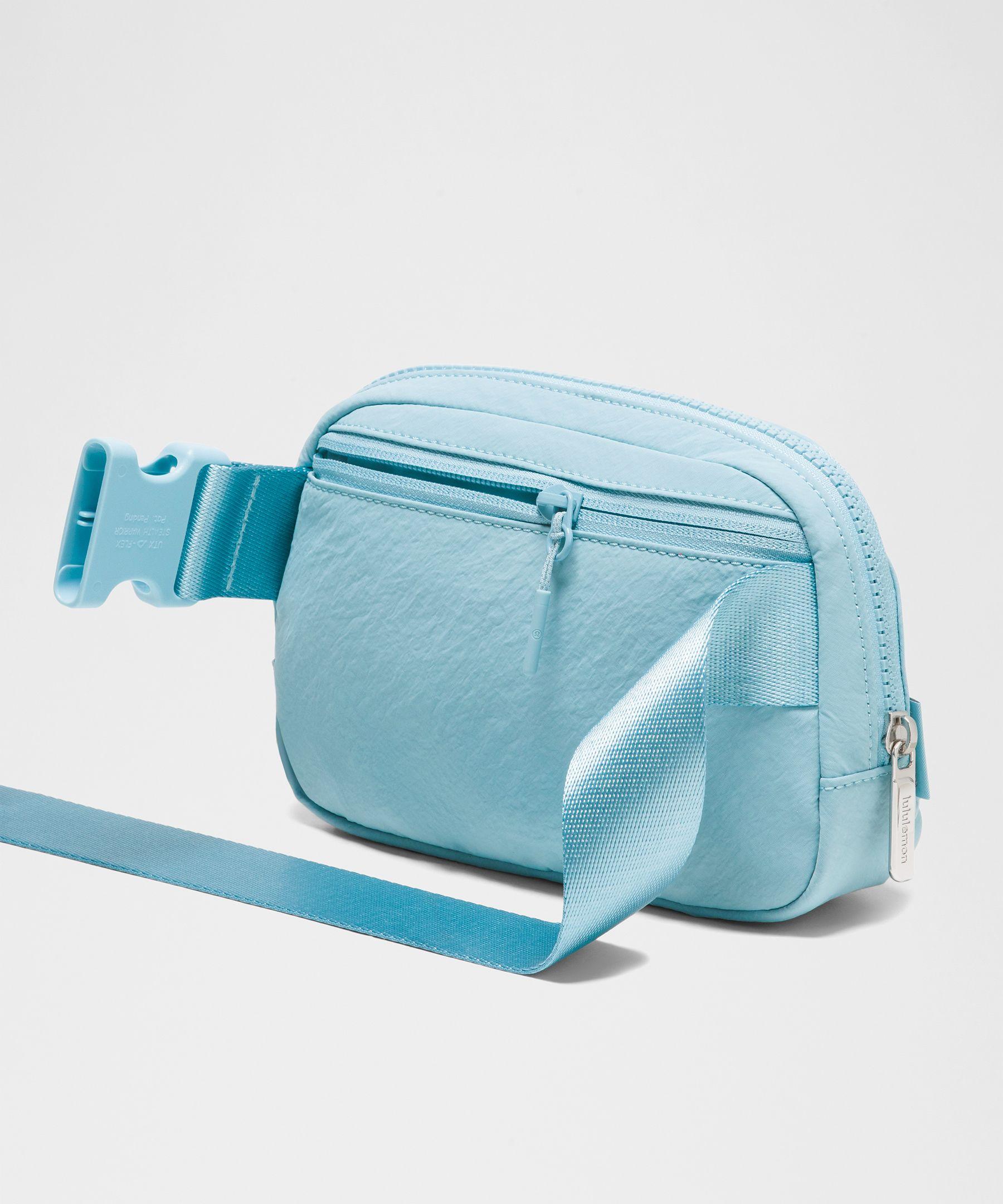 light blue lululemon bag Everywhere Crossbody Belt 1L Way Zipper lululemon Everywhere Backpack 22L |