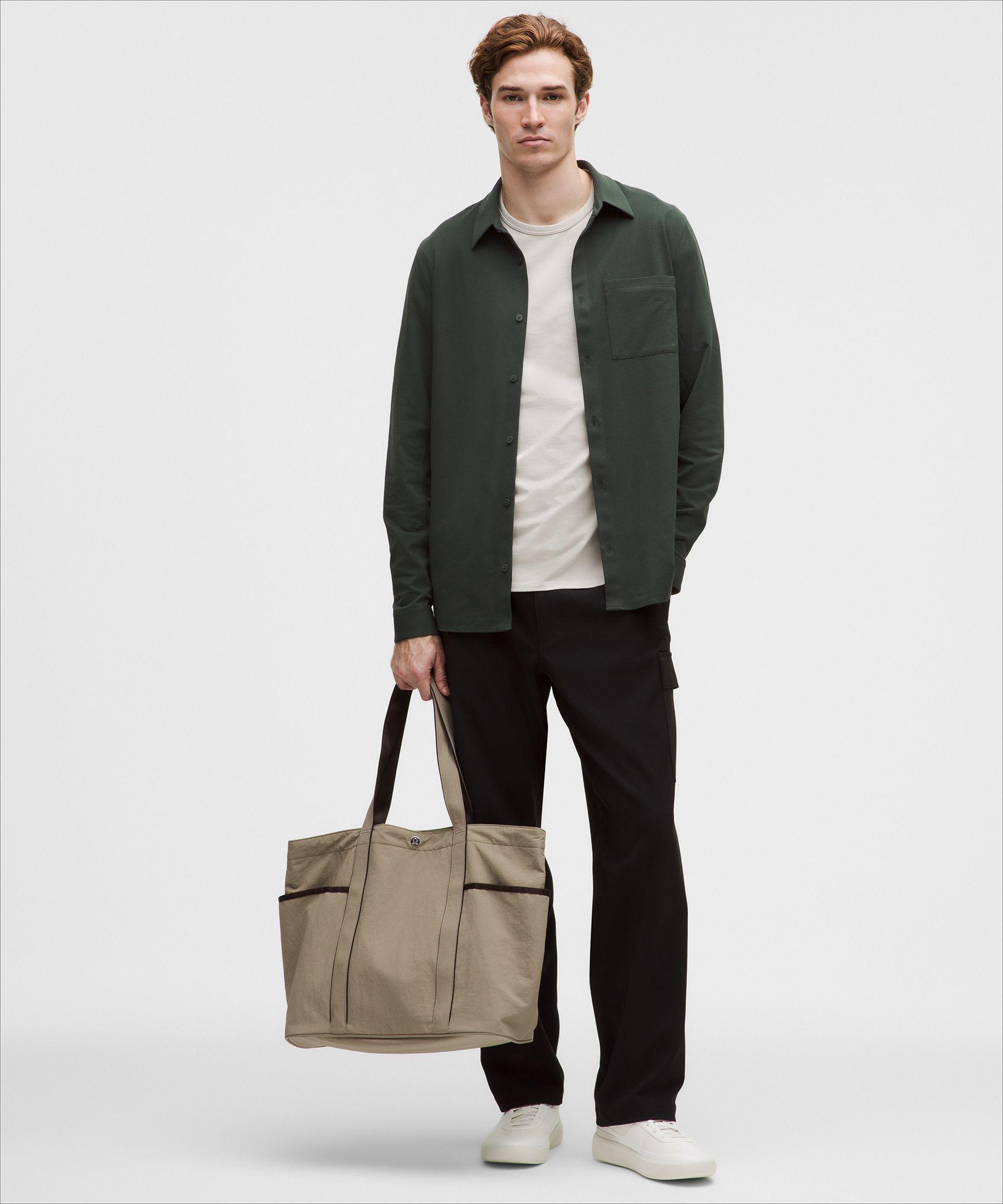 patagonia black holes sales 40L Hole Duffel Unity Fitz: Ink Black Bellroy - Slim Sleeve but with a huge Eco Products Color:Leopard Rose