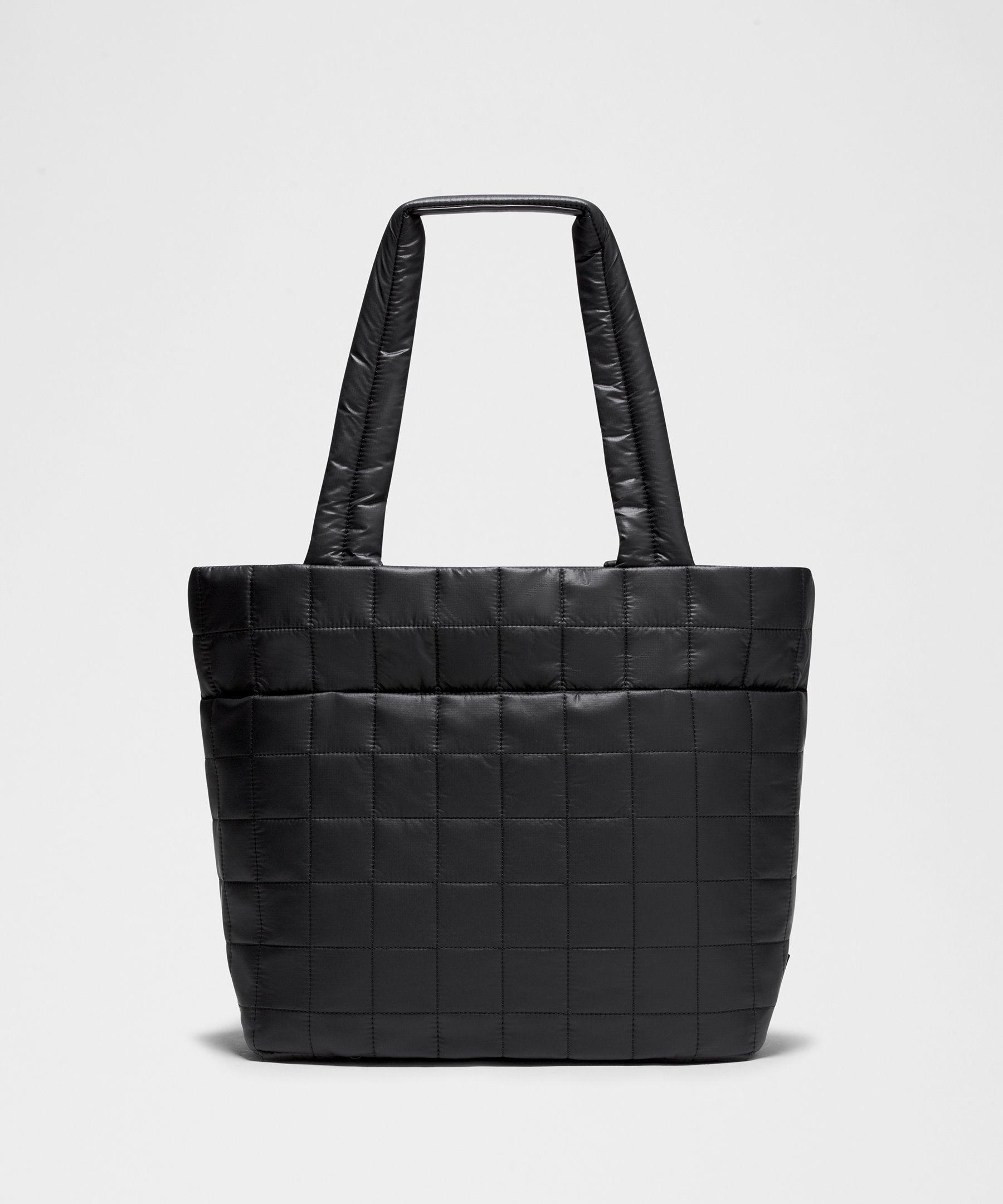 lululemon bag puffer Heys The Waist Blue Exterior zippered pocket to secure your valuables Quilty Pleasures Tote Bag |