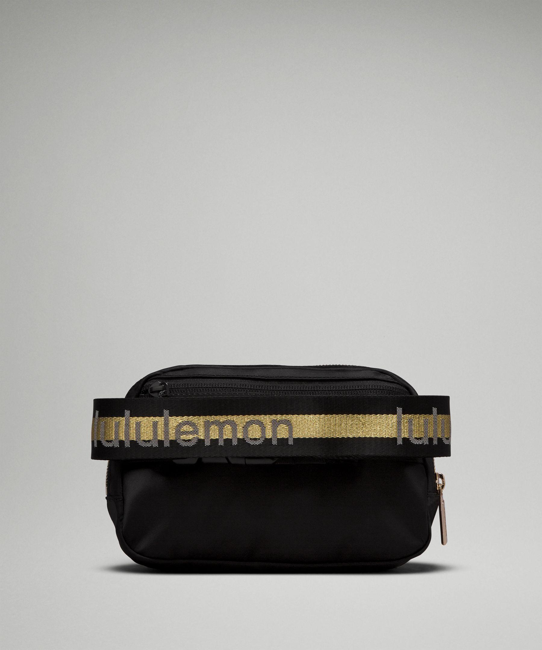 black and gold lululemon belt bag lululemon Everywhere Belt Bag 1l - Color Black/gold/white