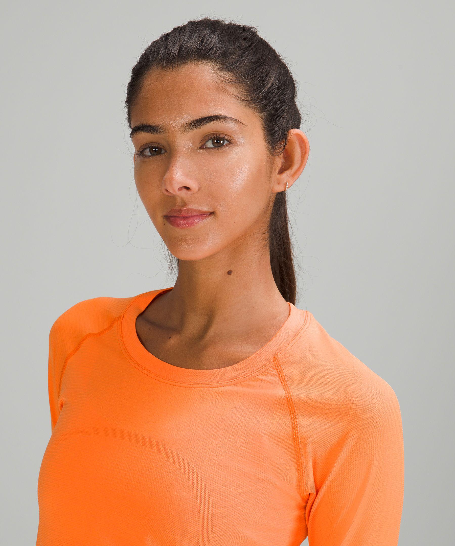 https://cdna.lystit.com/photos/lululemon/c3e74521/lululemon-athletica-designer-Orange-SodaOrange-Soda-Swiftly-Tech-Long-Sleeve-Shirt-20-Race-Length.jpeg