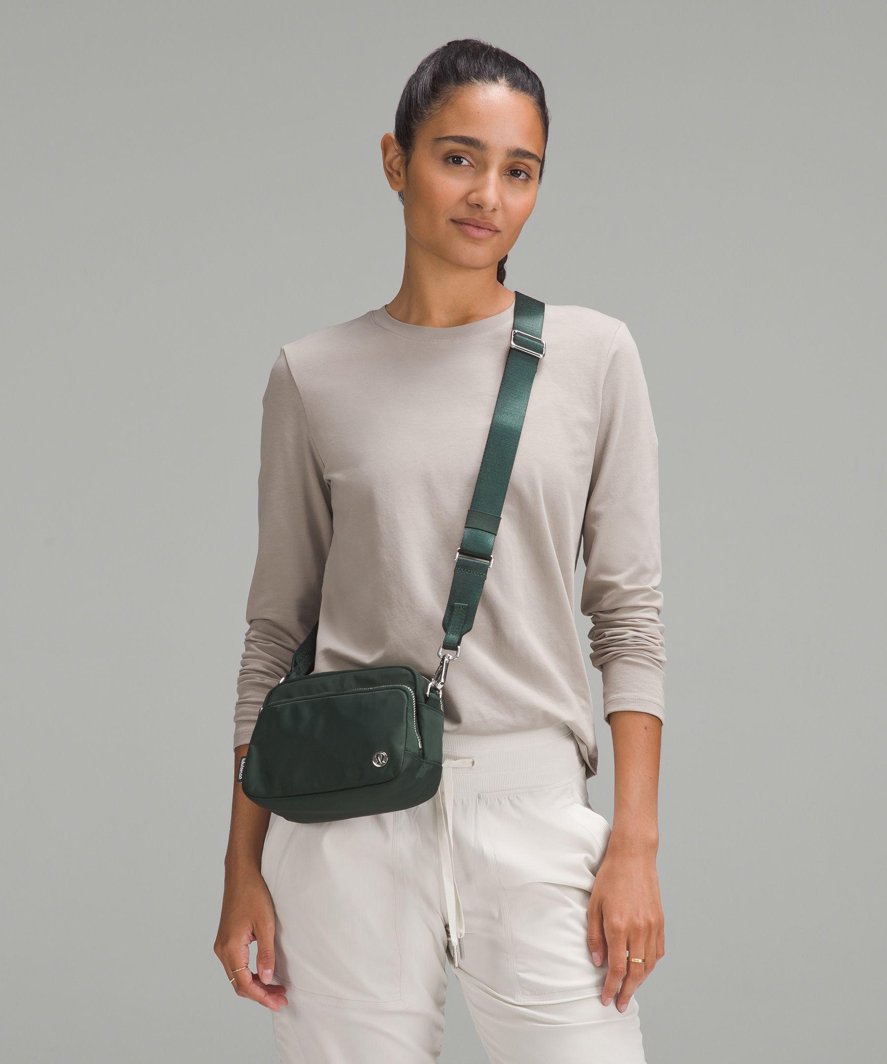 crossbody lululemon bag Multi-Pocket 2.5L  Peloton Apparel it features a secure main compartment for your essentials Lululemon Curved Crossbody Bag With