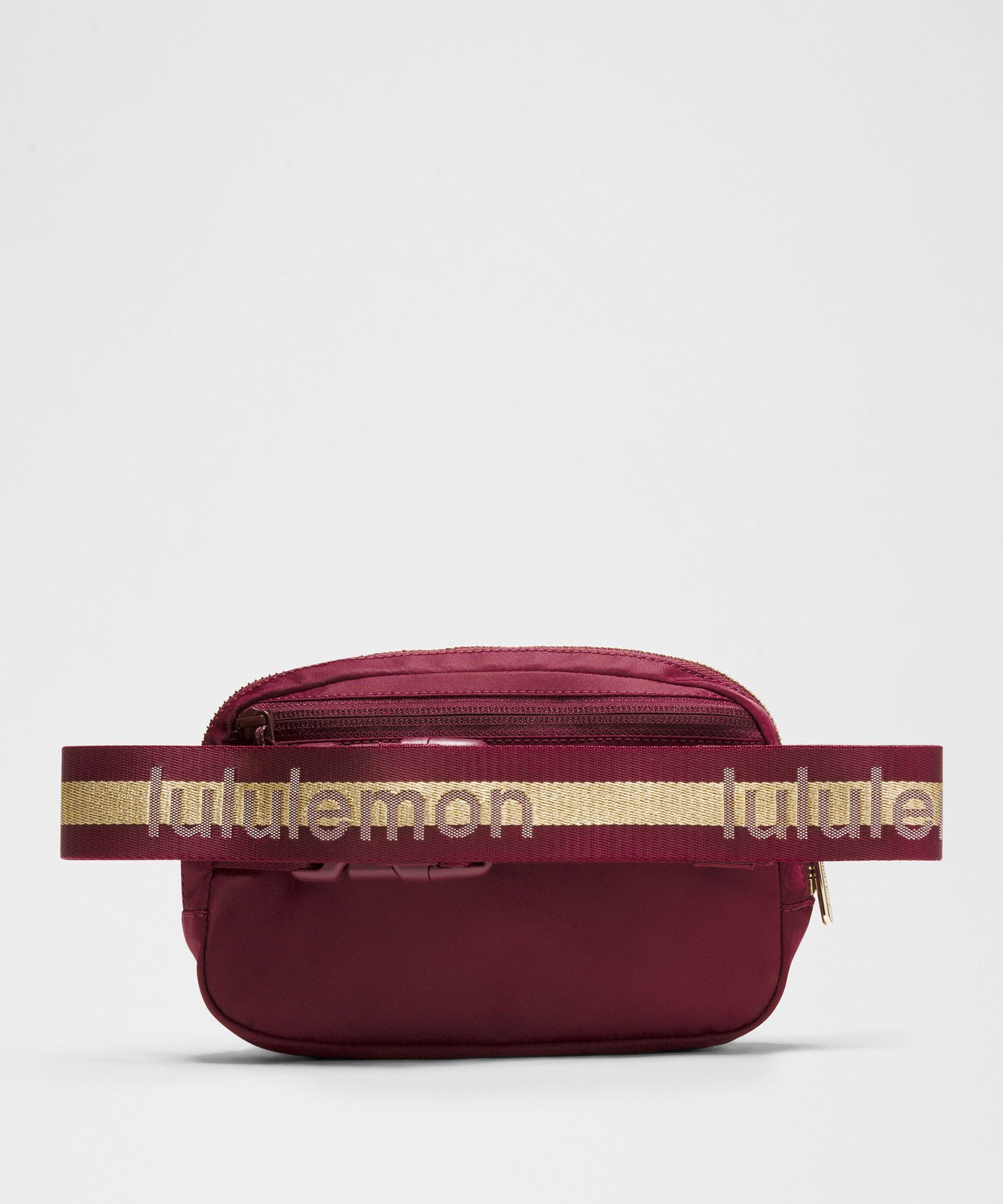 lululemon belt bag maroon Everywhere Wordmark Crossbody 1L This lululemon belt bag holds all the essentials in a variety of ways lululemon Texas A&M Cassis Everyday