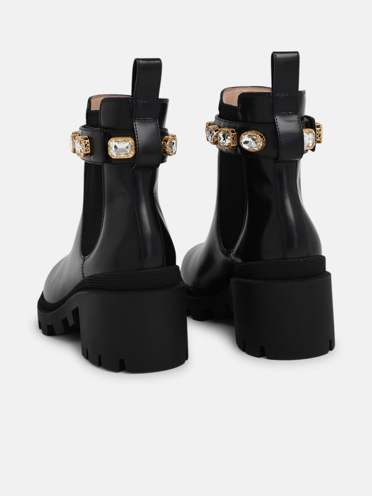 leather ankle boot with belt gucci