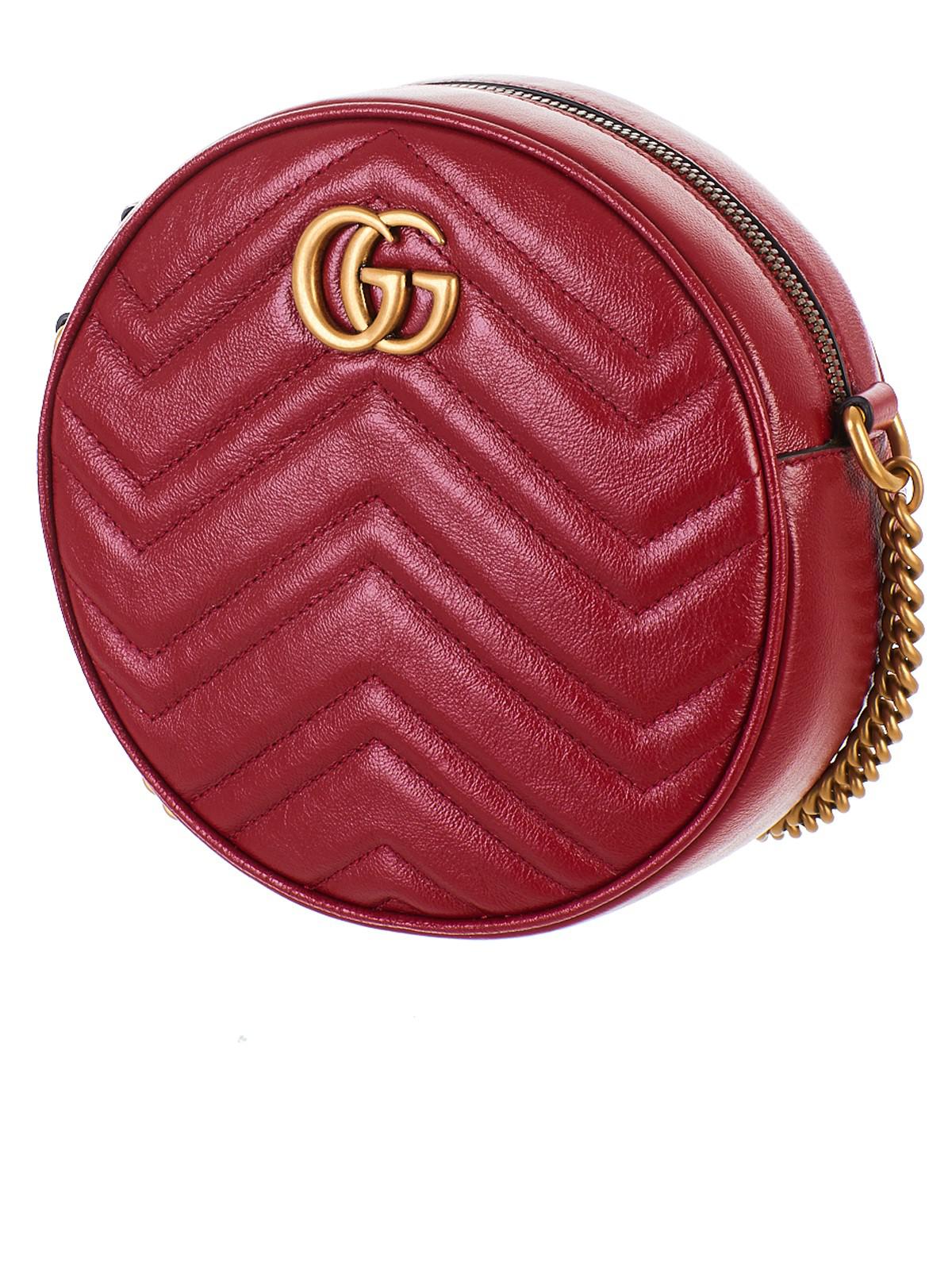 Mini borsa a spalla rotonda GG Marmont di Gucci in Rosso | Lyst