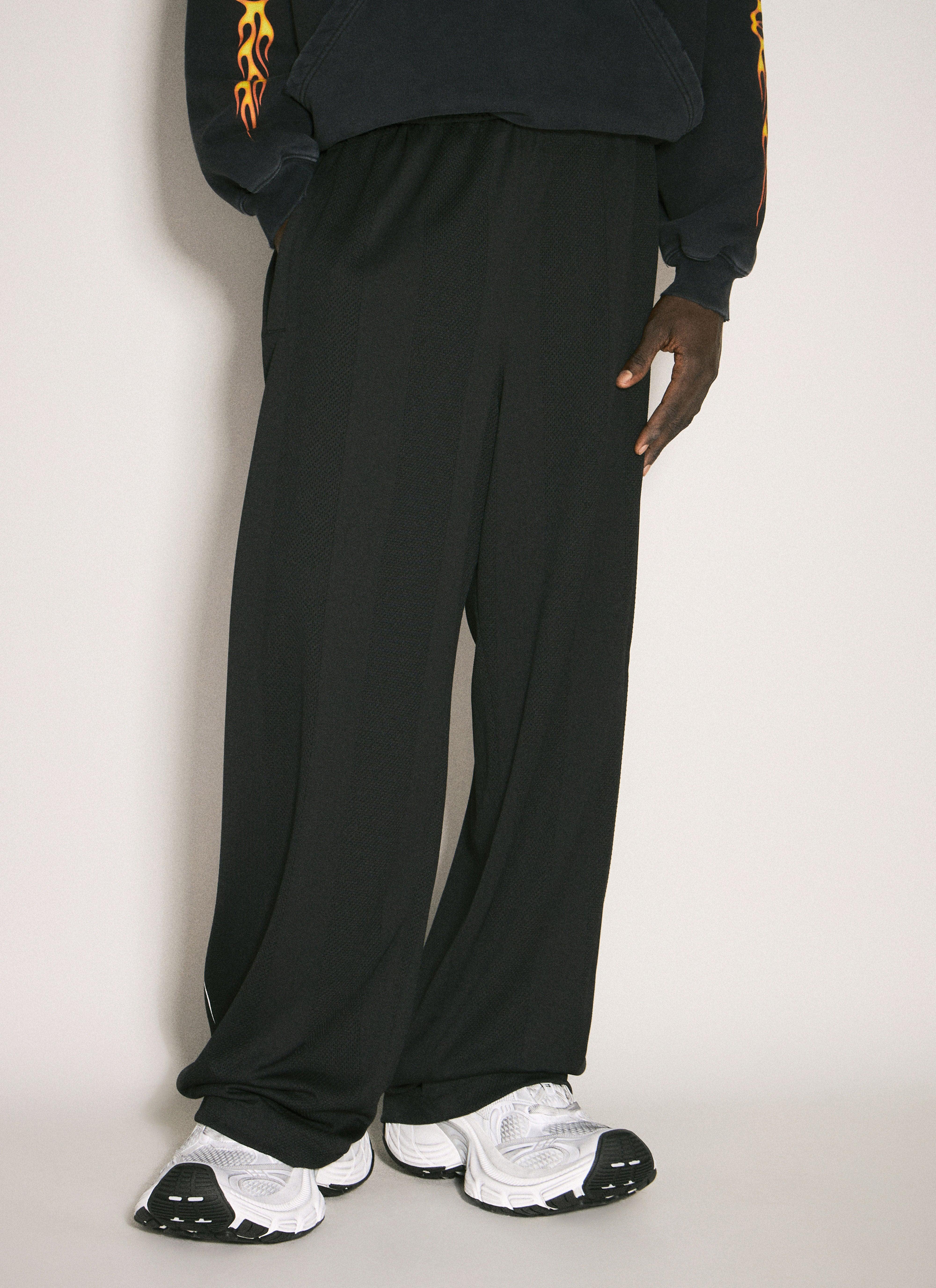 Balenciaga Burning Unity Baggy Trackpants in Black for Men Balenciaga Burning Unity Baggy Trackpants in Black for Men