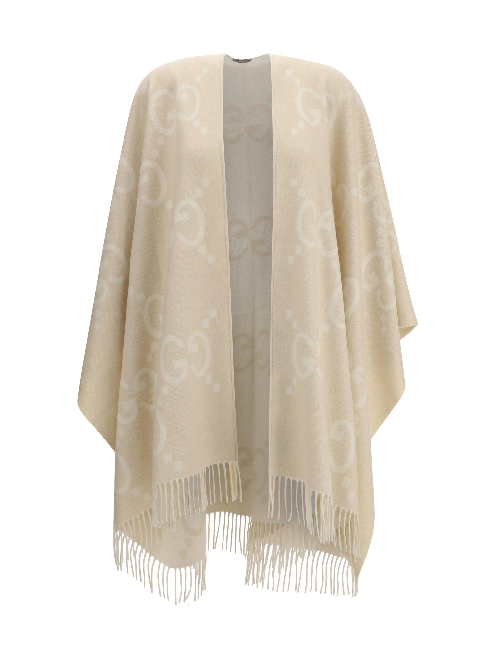 ポンチョ・ケープ Gucci Poncho In Lana Gg Women's Gucci Ponchos and poncho dresses | Lyst