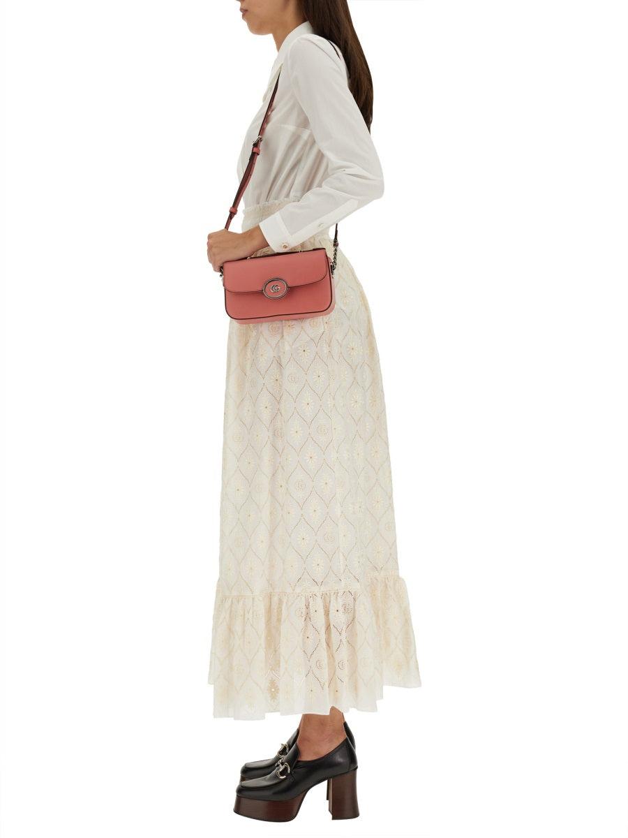 スカート GUCCI FLORAL BRODERIE ANGLAISE SKIRT WITH DOUBLE G Double G floral broderie anglaise skirt in ivory | GUCCI® SG