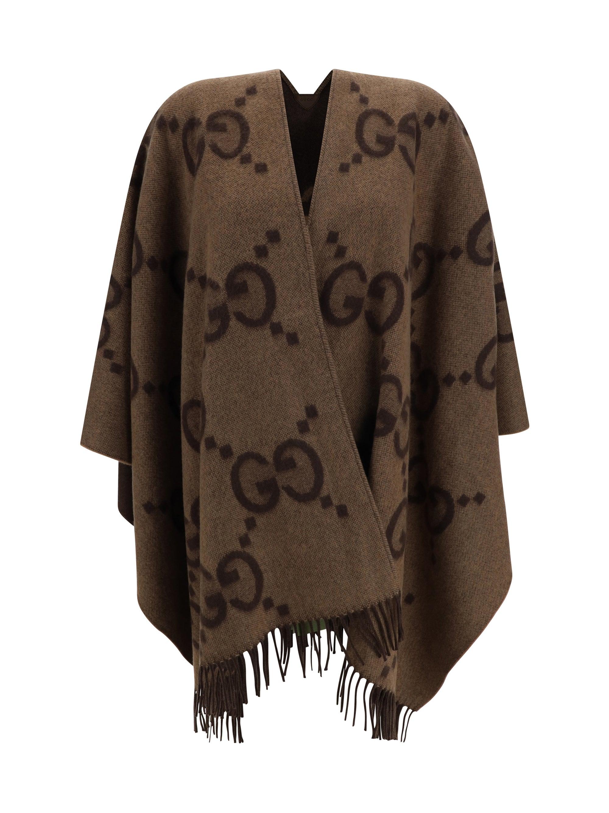 ポンチョ・ケープ Gucci Poncho In Lana Gg Women's Gucci Ponchos and poncho dresses | Lyst